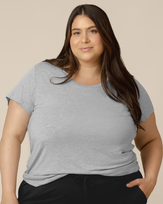 Front view of model wearing the Everyday Maternity & Nursing T-shirt in Grey Heather with a front tuck @model_info:Gia is wearing a 2X.