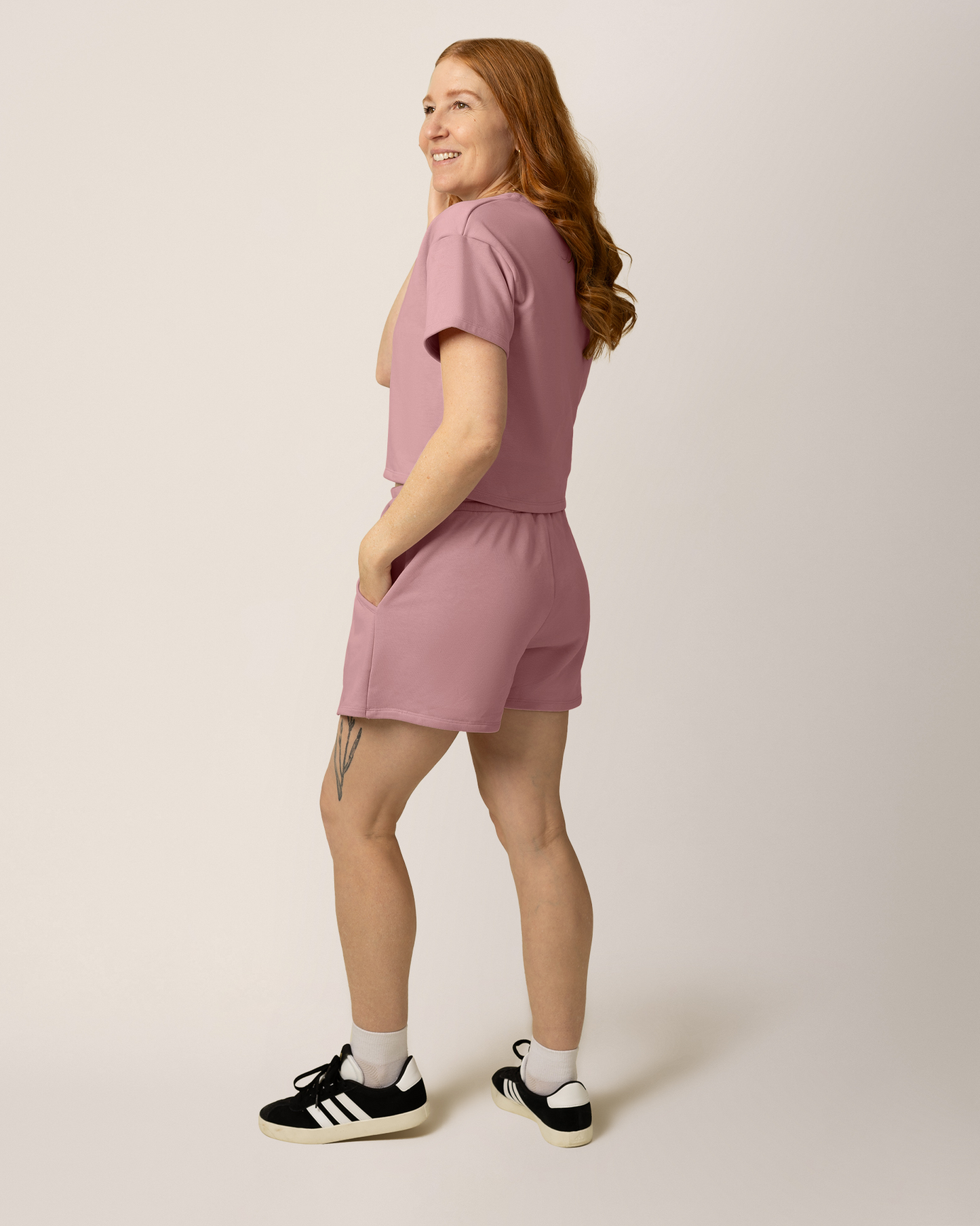 Back view of model wearing French Terry Nursing T-shirt in Light Mauve with matching French Terry On the Go Skort