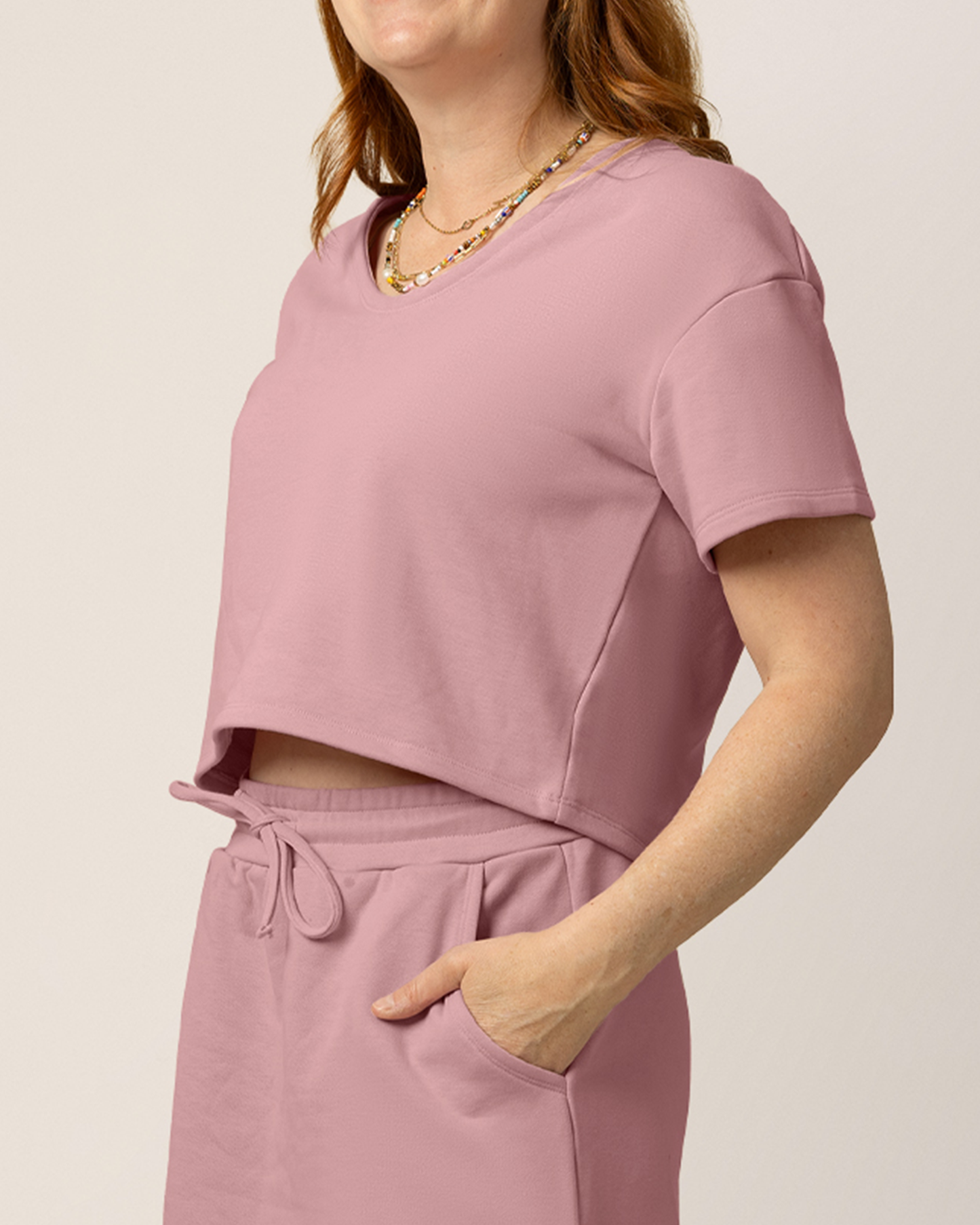 Side view of model wearing French Terry Nursing T-shirt in Light Mauve with matching French Terry On the Go Skort