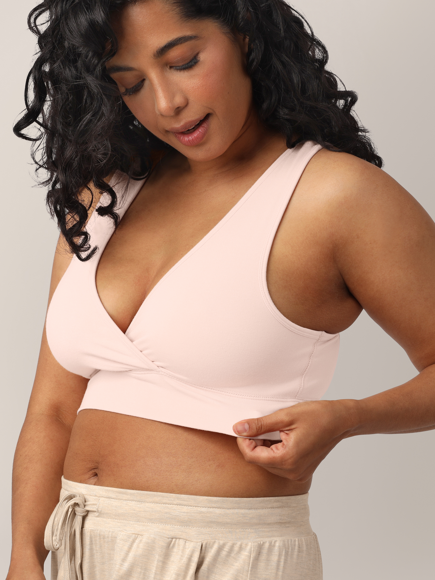 Model wearing the French Terry Racerback Nursing & Sleep Bra in Soft Pink