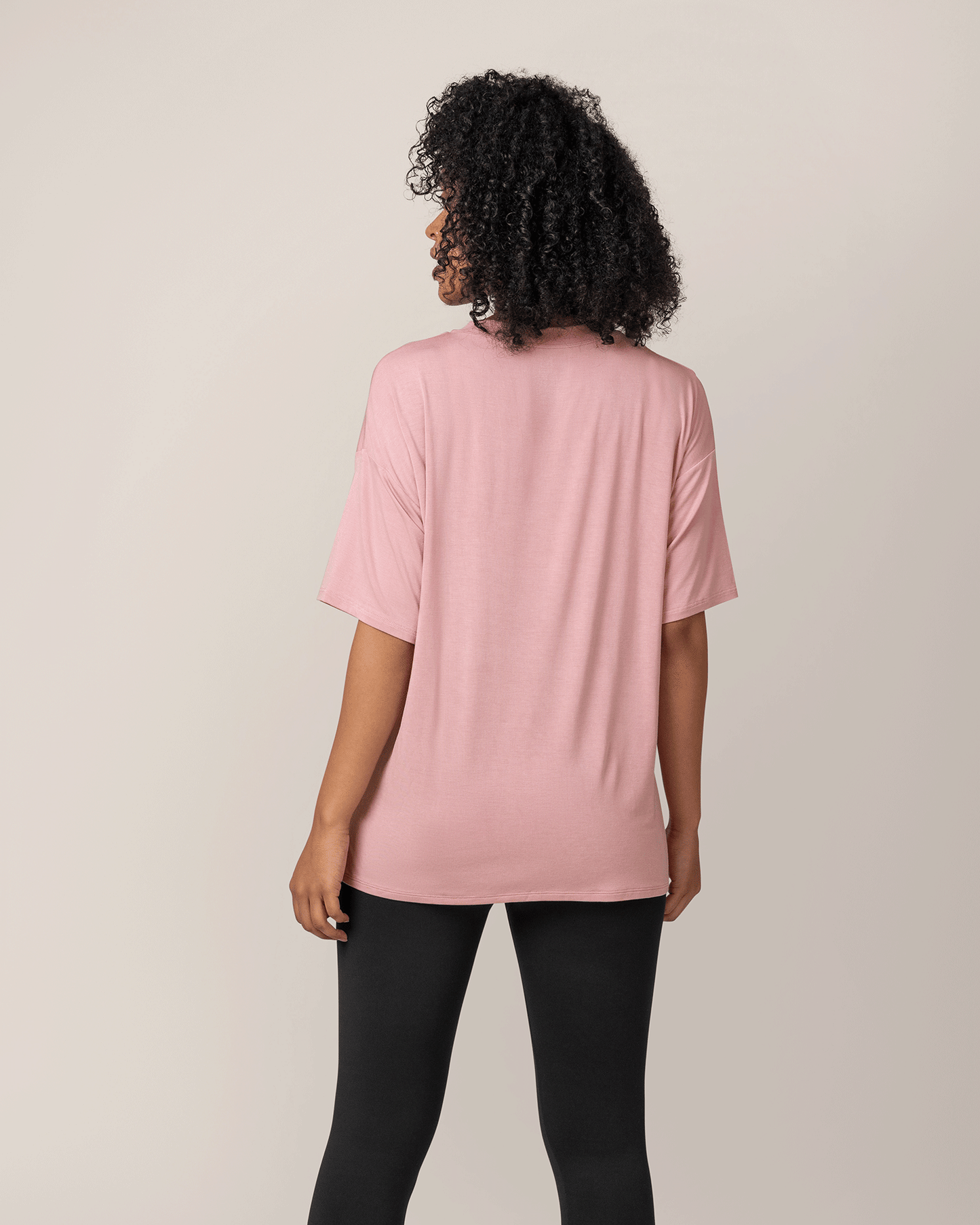 Back view of model wearing Oversized Graphic Tee inLove Feed Repeat