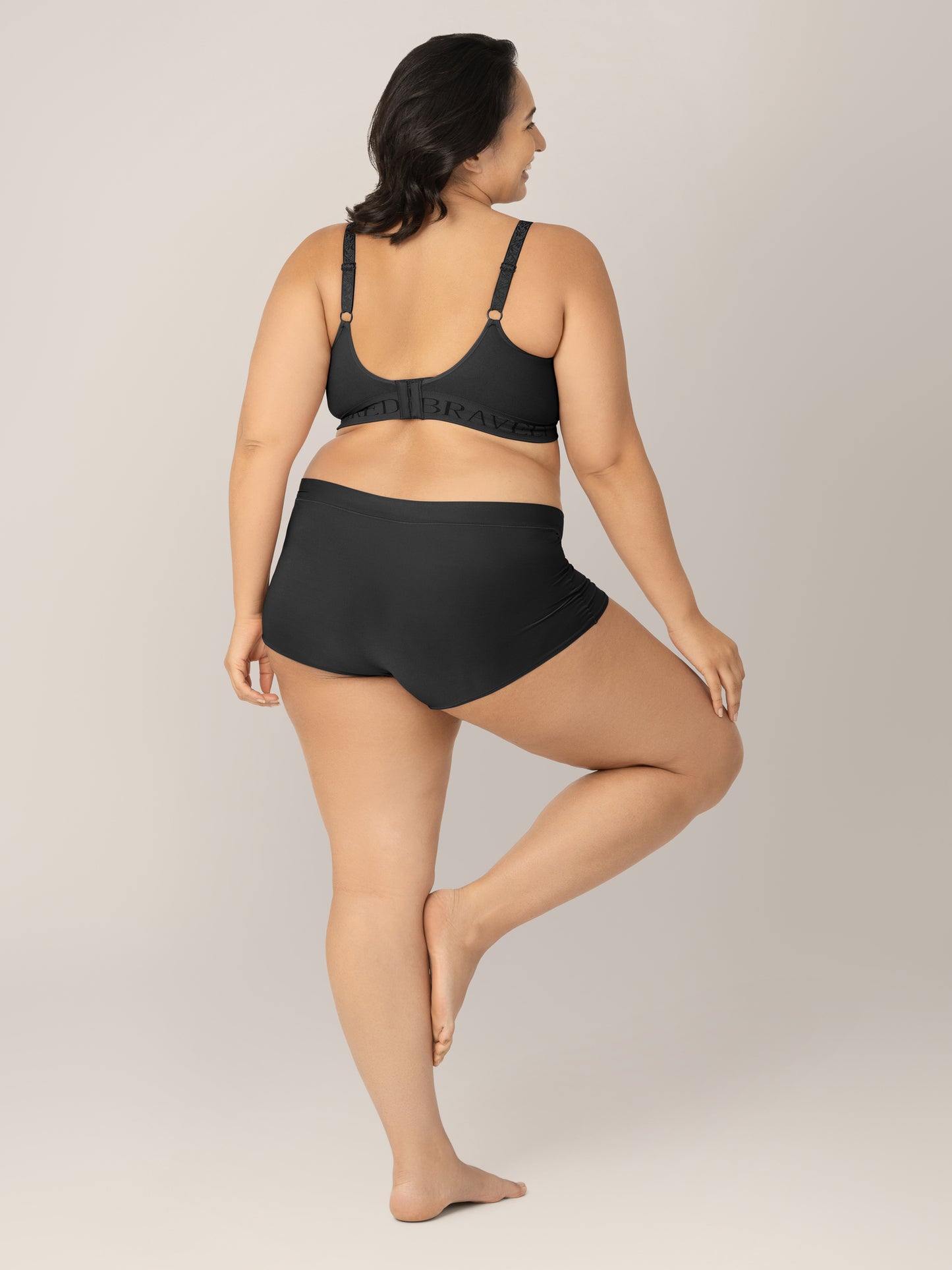 Back view of Model wearing the Black Grow with Me™ Maternity & Postpartum Boyshort .