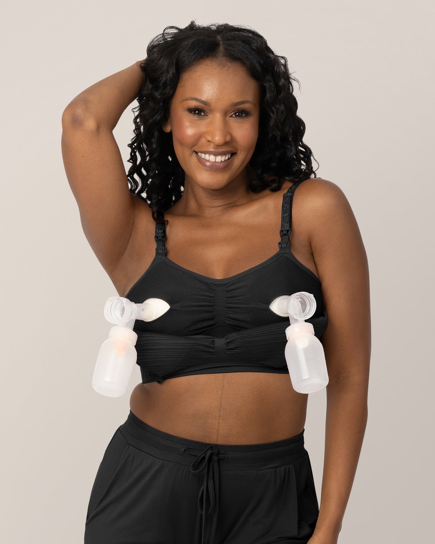 Model wearing the Sublime® Hands-Free Pumping & Nursing Bra in Black
