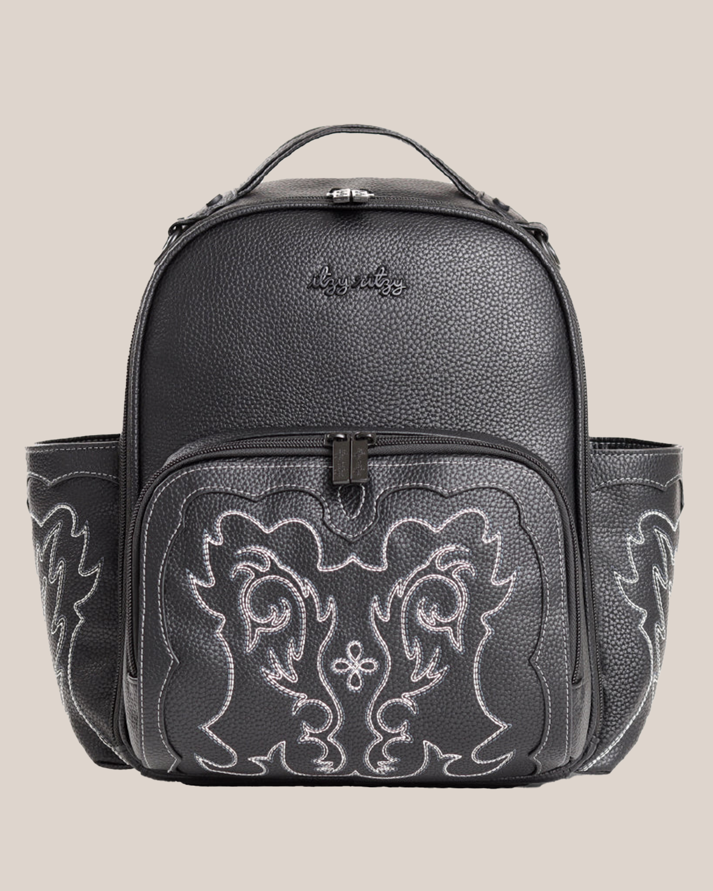Front view of the Itzy Ritzy - Nash Itzy Mini Plus™ Diaper Bag in Outlaw