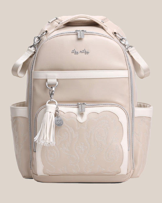 Front view of the Itzy Ritzy - Nash Boss Plus™ Diaper Bag in Oat