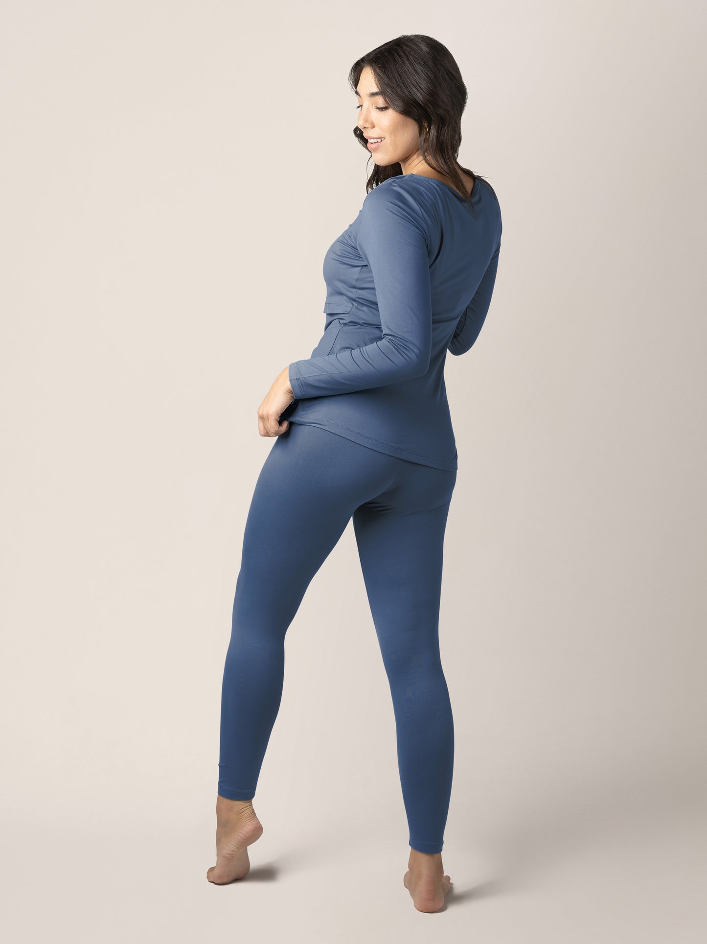 Back view of a model wearing the Jane Nursing Pajama Set in Slate Blue.