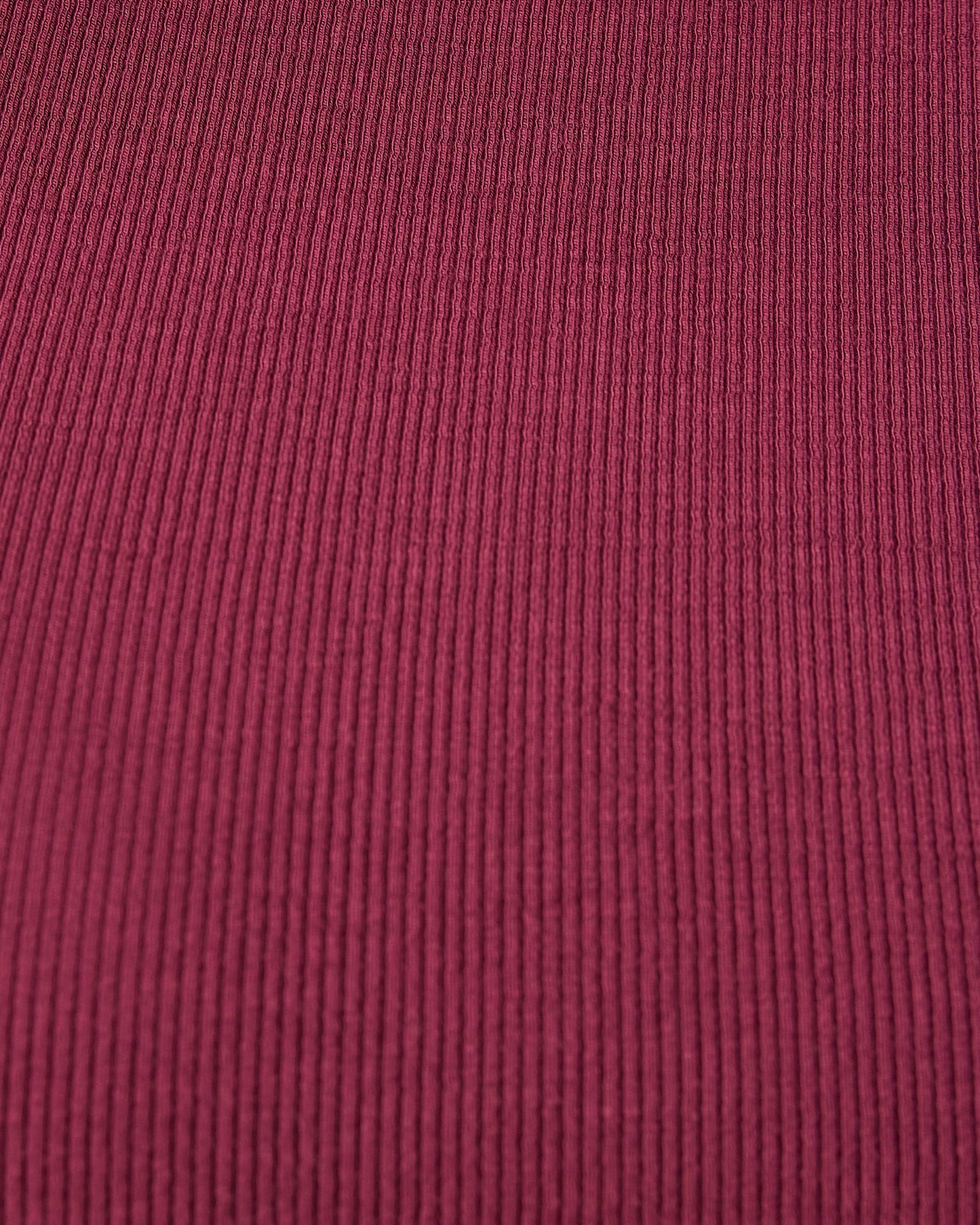 Close up of ribbed texture on the Ribbed Bamboo Crew Neck Nursing T-shirt in Deep Burgundy.