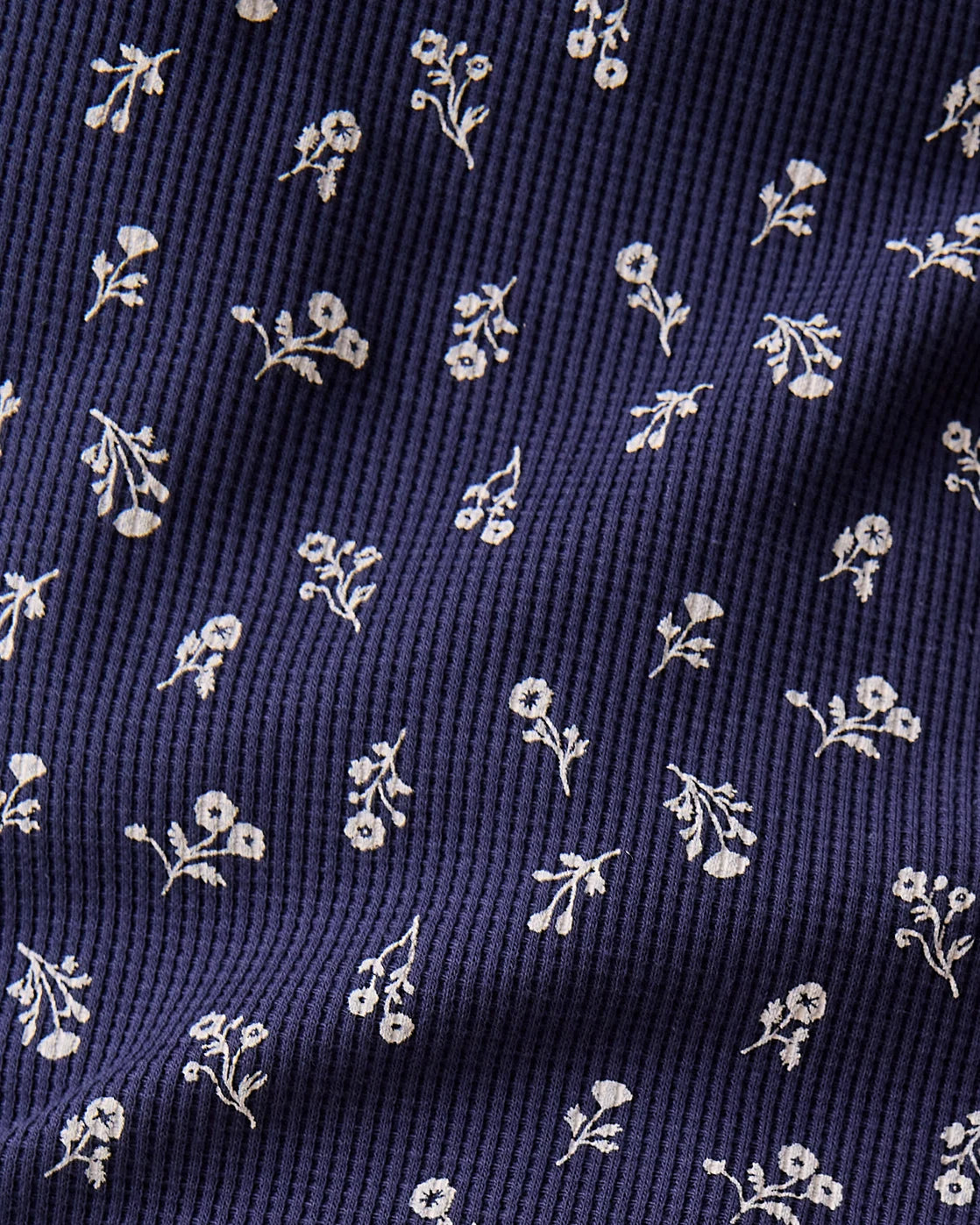 Close up of pattern and fabric of Waffle Maternity & Nursing Lounge Set in Navy Wildflower.