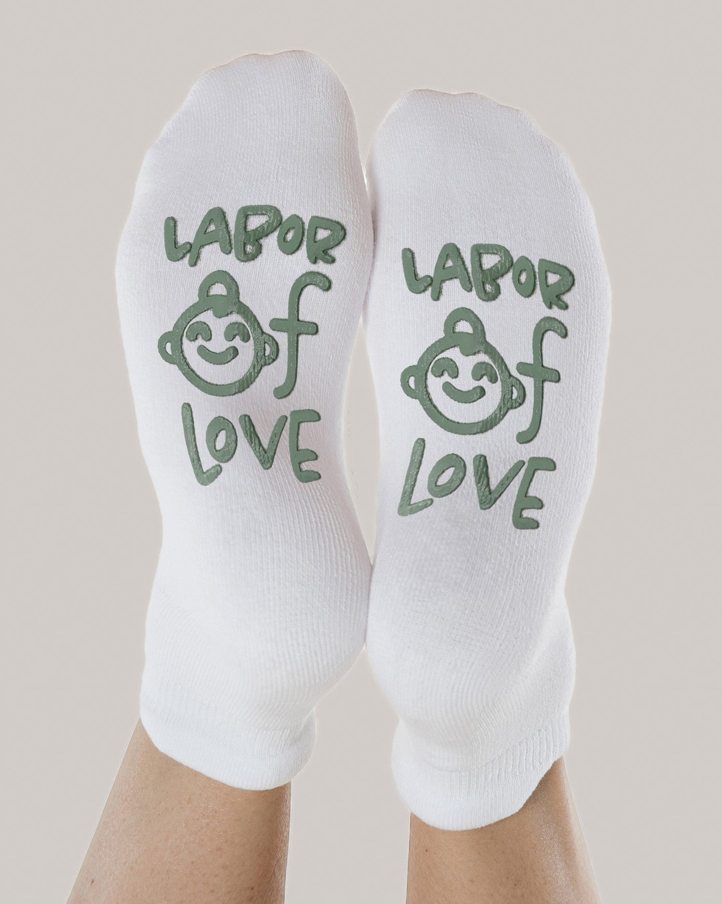 Labor of Love Labor & Delivery Socks in sage on model's feet