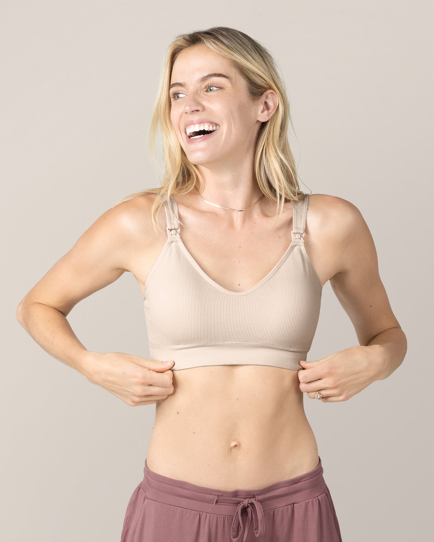 Front view of model wearing the Mia Maternity & Nursing Lounge Bra in Stone.@model_info:Mia is wearing a Small.