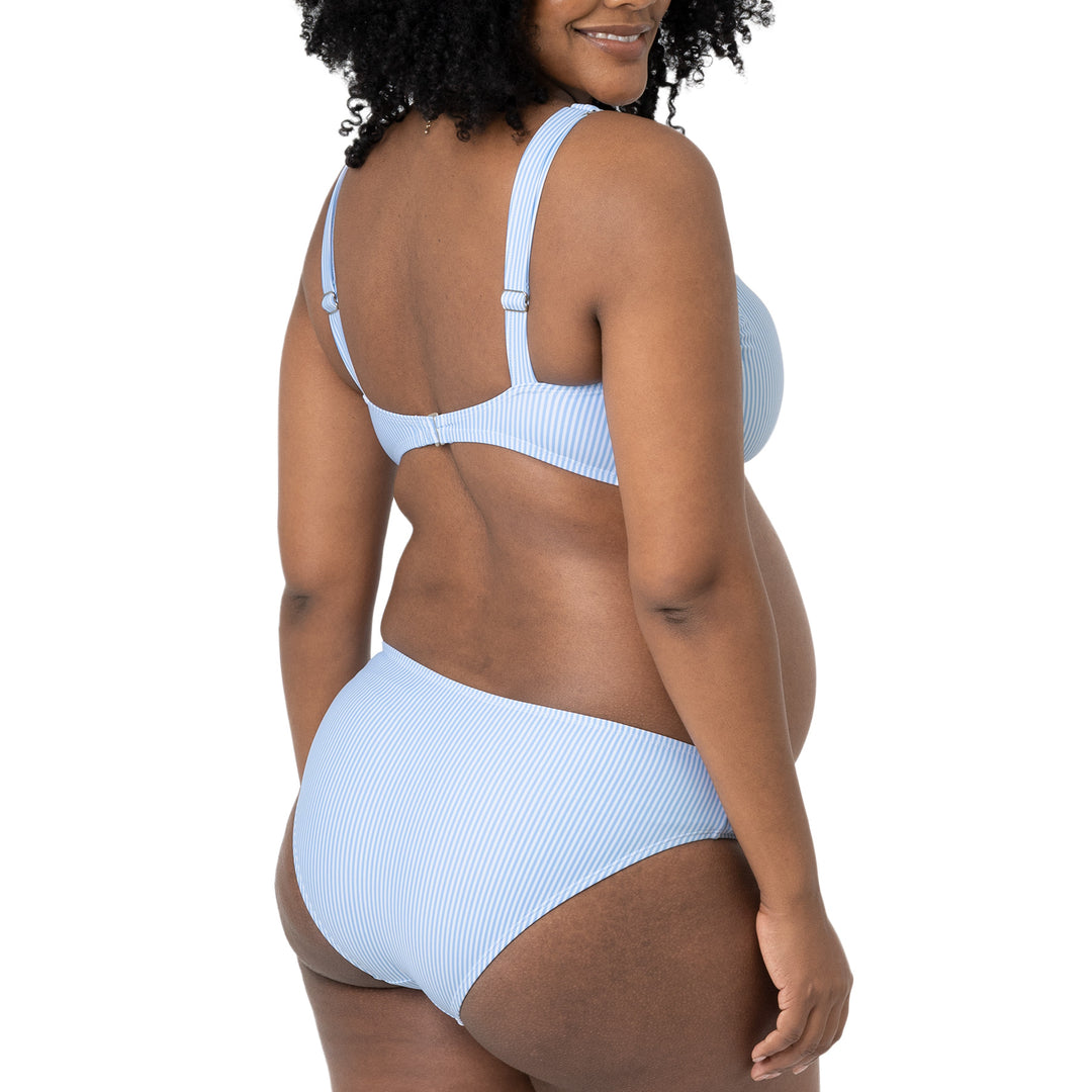 Back view of a model wearing the Low Rise Maternity & Postpartum Bikini Bottom in Coastal Stripe