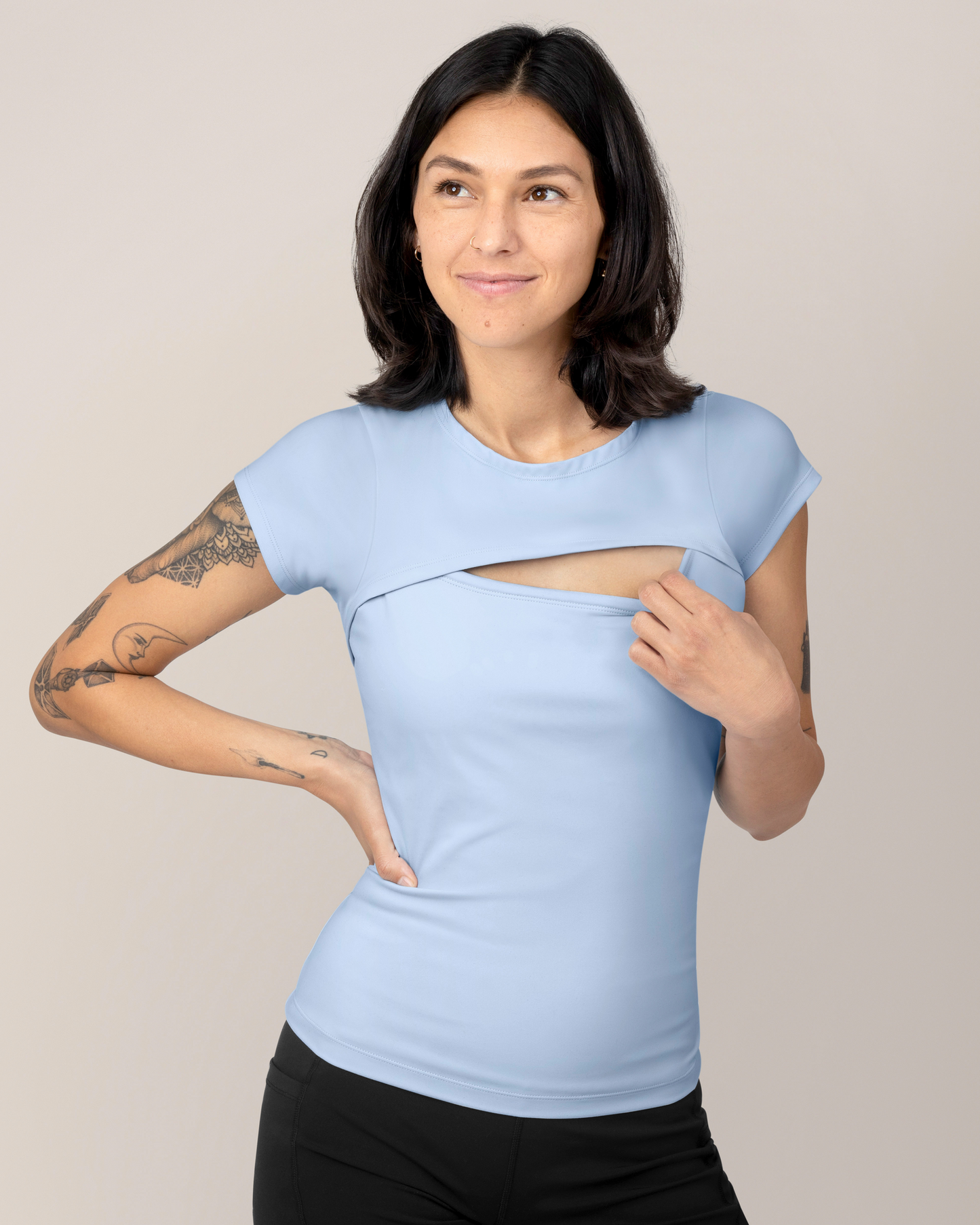 Front view of model wearing the Luna Active Cut Out Nursing Top in French Blue