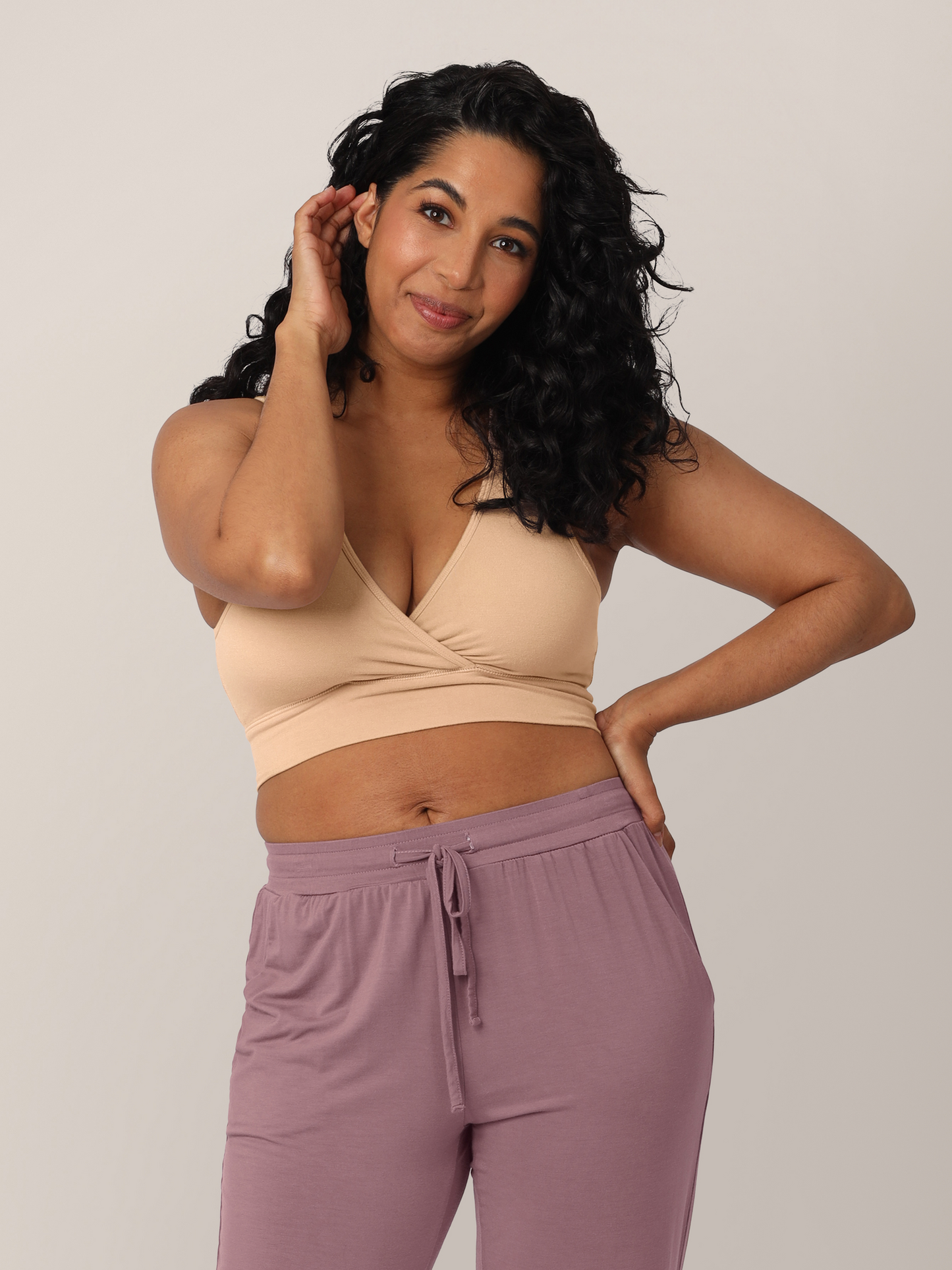 Front view of model wearing the French Terry Racerback Nursing & Sleep Bra in Beige @model_info:Zakeeya is wearing a Small.