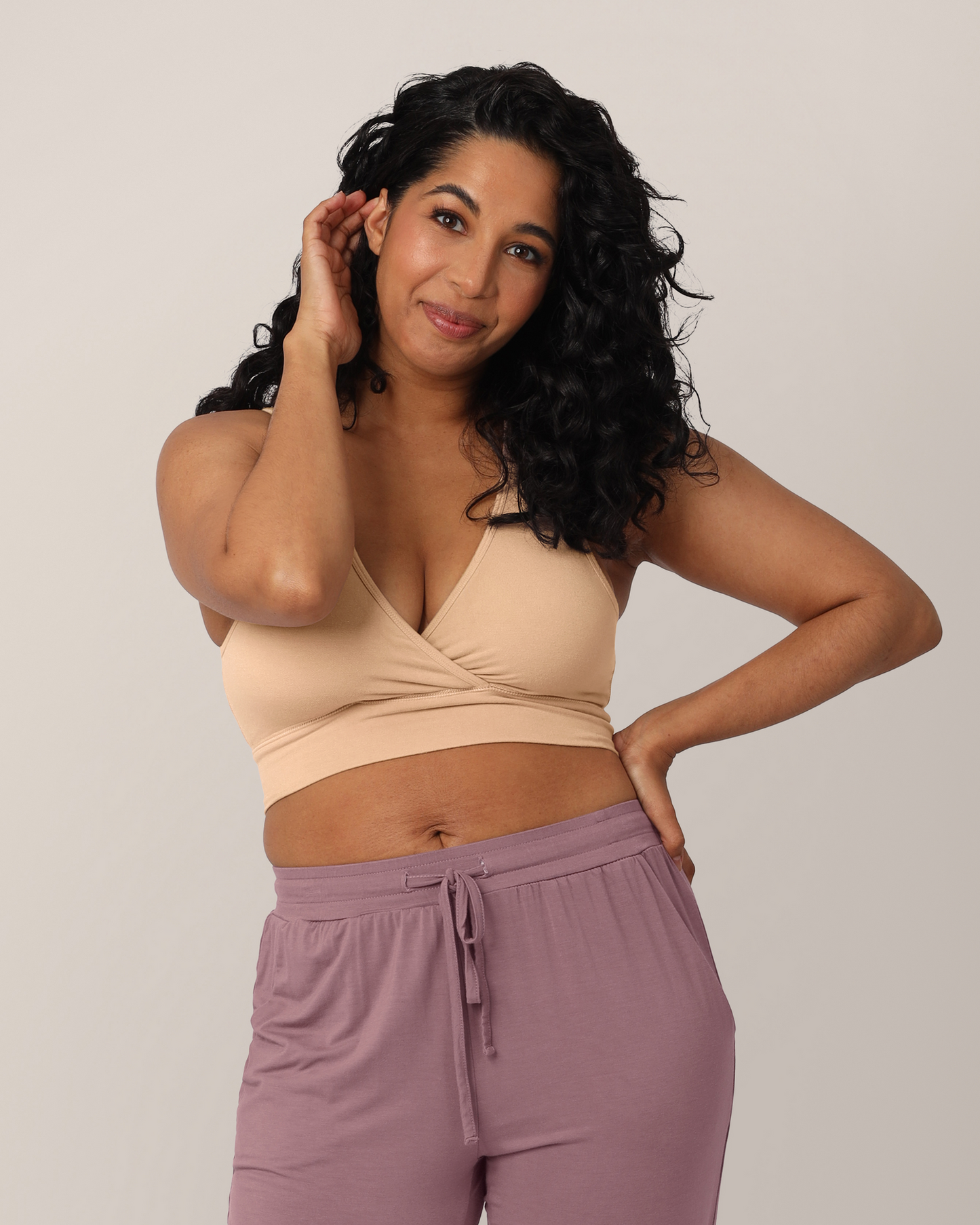 Front view of model wearing the French Terry Racerback Nursing & Sleep Bra in Beige @model_info:Zakeeya is wearing a Small.