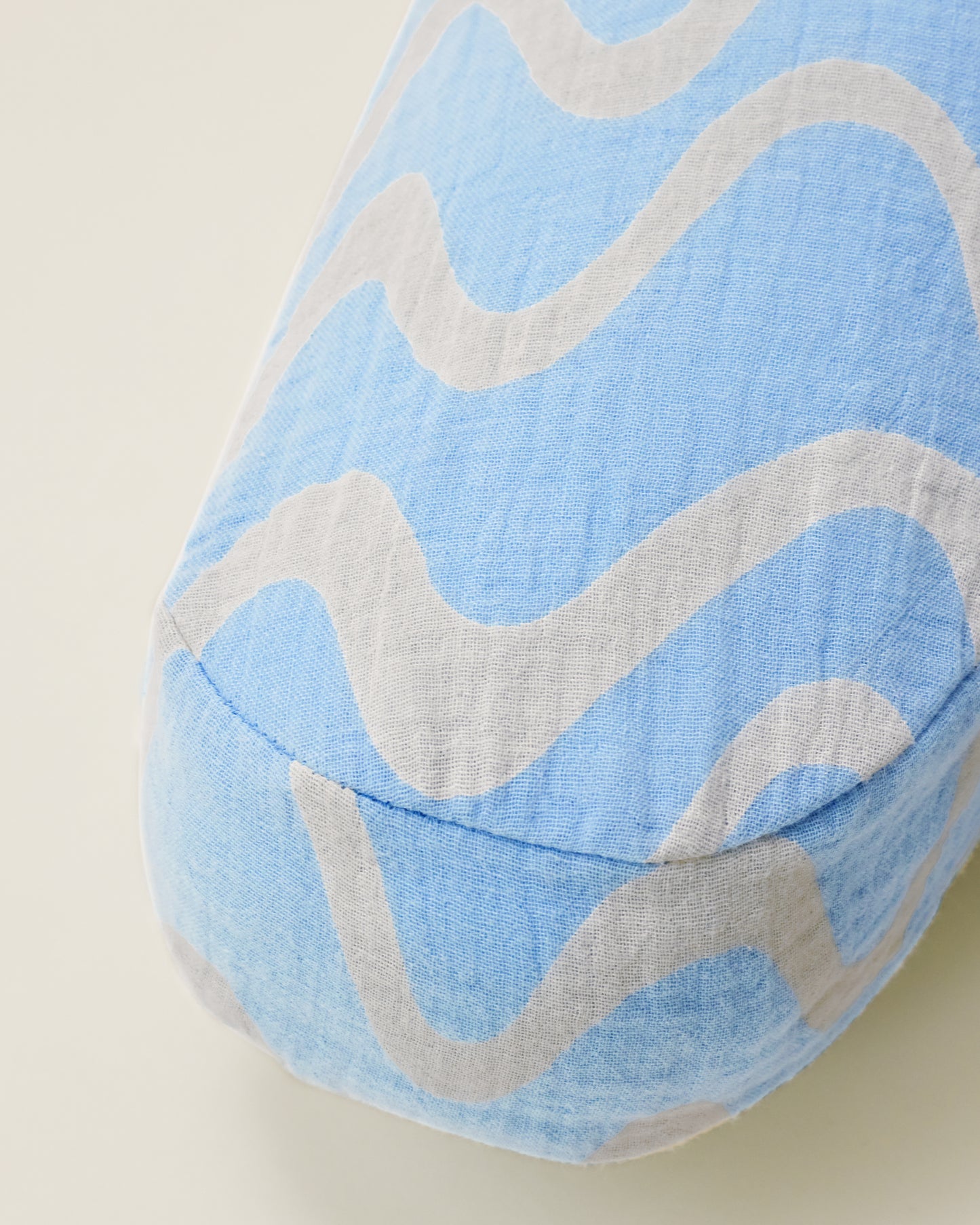 Close up of Organic Muslin Nursing Pillow Cover in the Blue Waves print