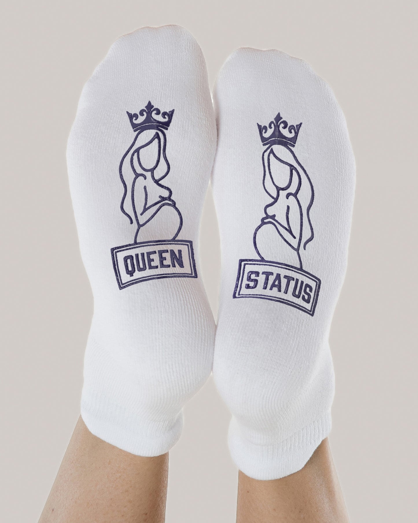 Queen Status Labor & Delivery Socks on model's feet