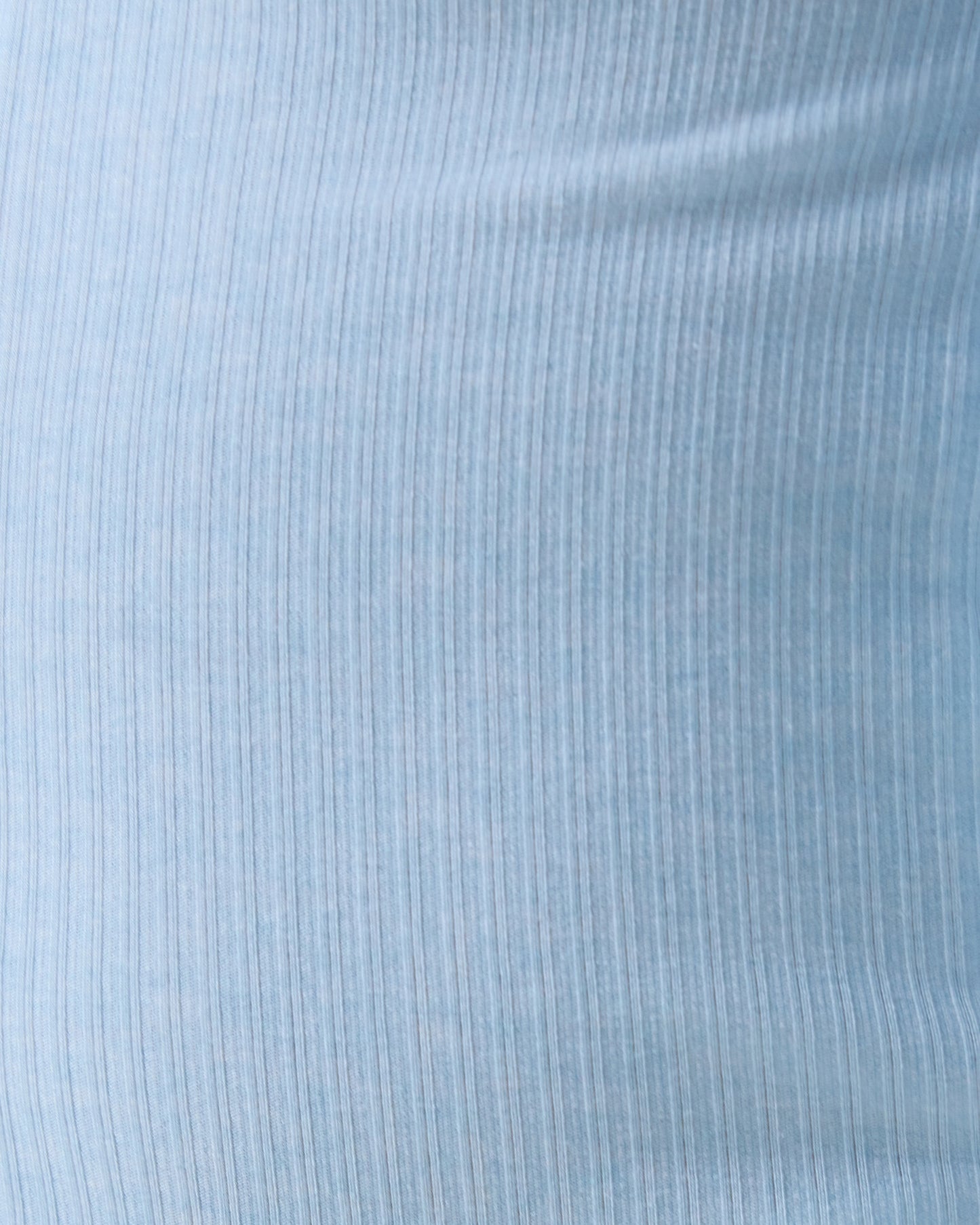 Close up of Baby wearing the Ribbed Bamboo Baby Pajama in Blue Heather