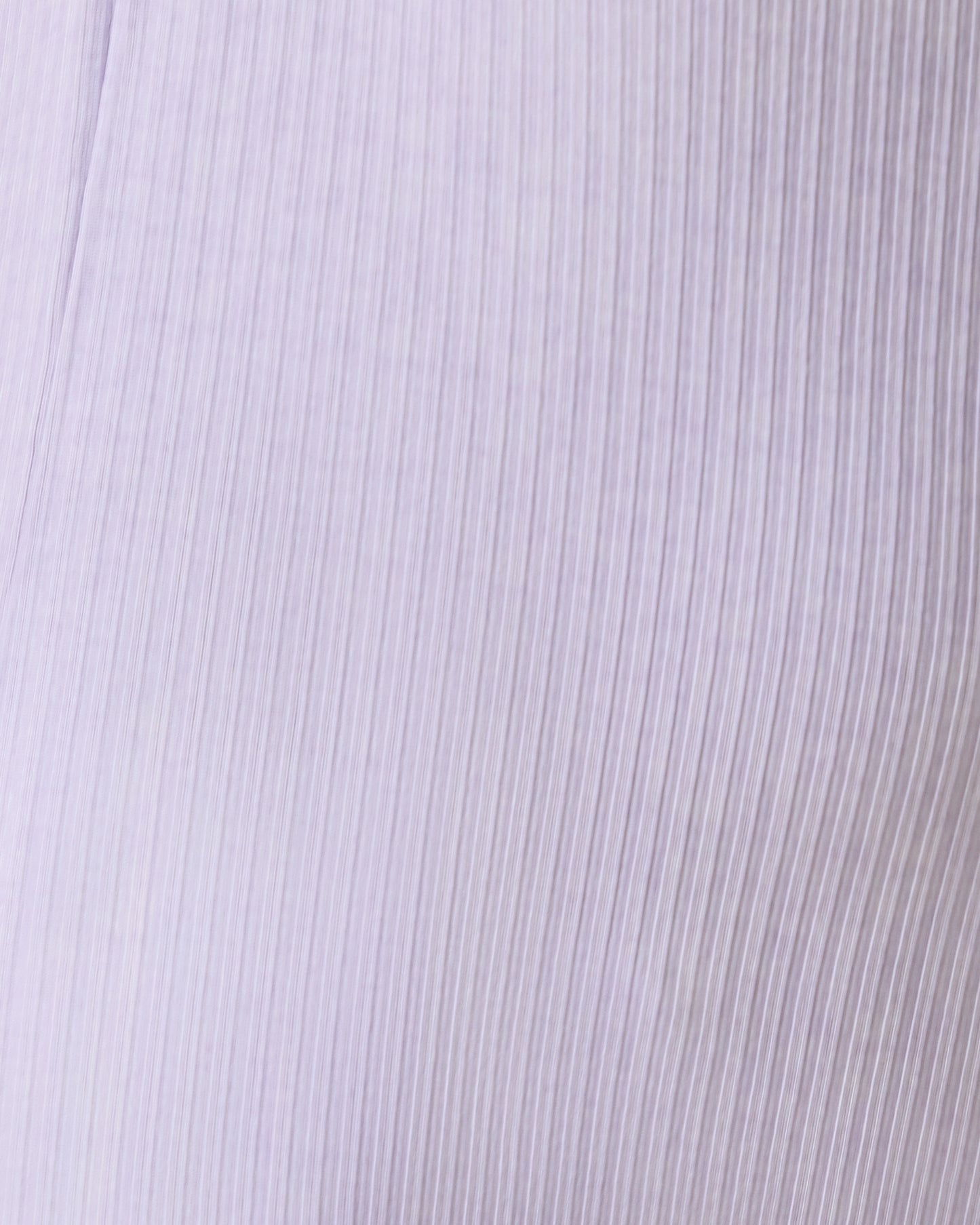 Close up of Baby wearing the Ribbed Bamboo Baby Pajama in Lilac Heather