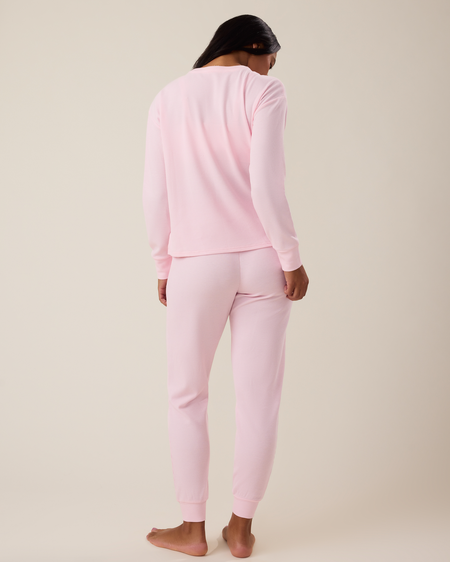 Back of woman wearing the Waffle Maternity & Nursing Lounge Set in pale pink