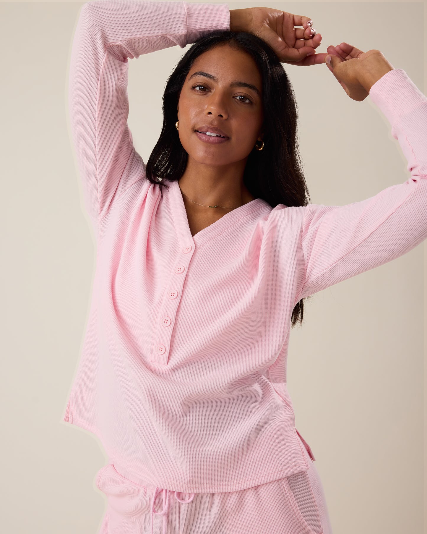 Woman wearing the Waffle Maternity & Nursing Lounge Set in pale pink