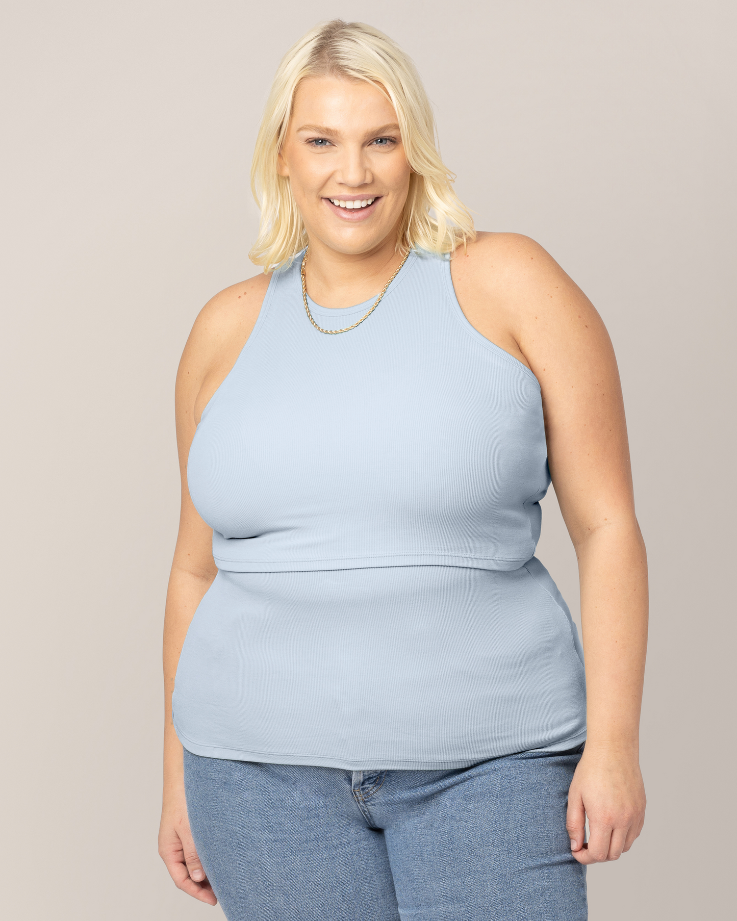 Front view of model wearing the Ribbed Bamboo Racerback Nursing Tank in French Blue