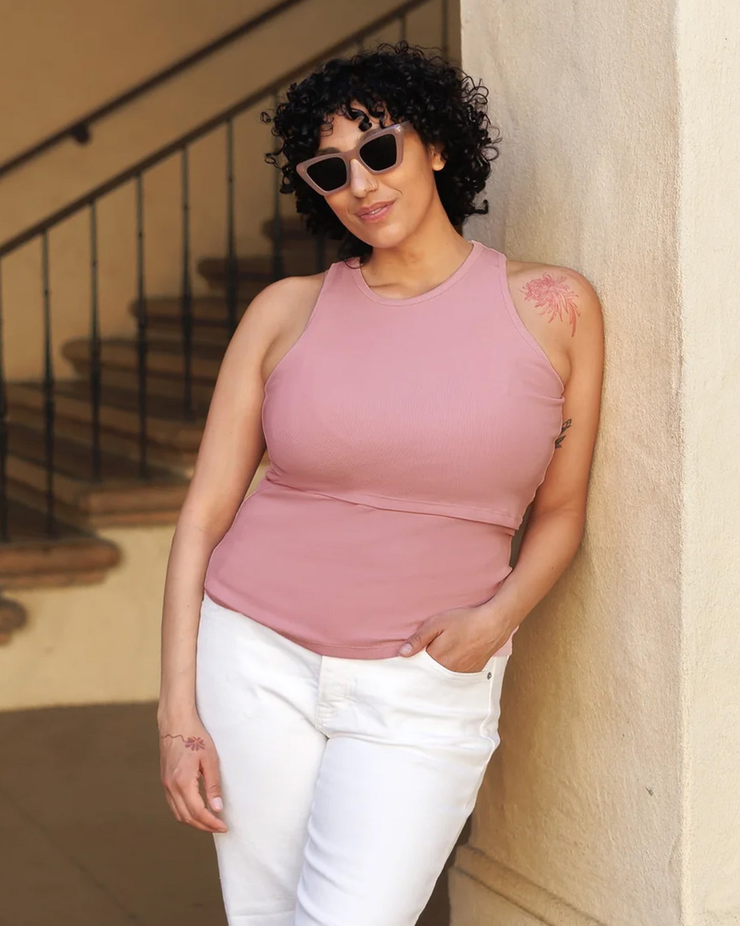 Model wearing the Ribbed Bamboo Racerback Nursing Tank in Light Mauve@model_info:Indira is wearing an X-Large.