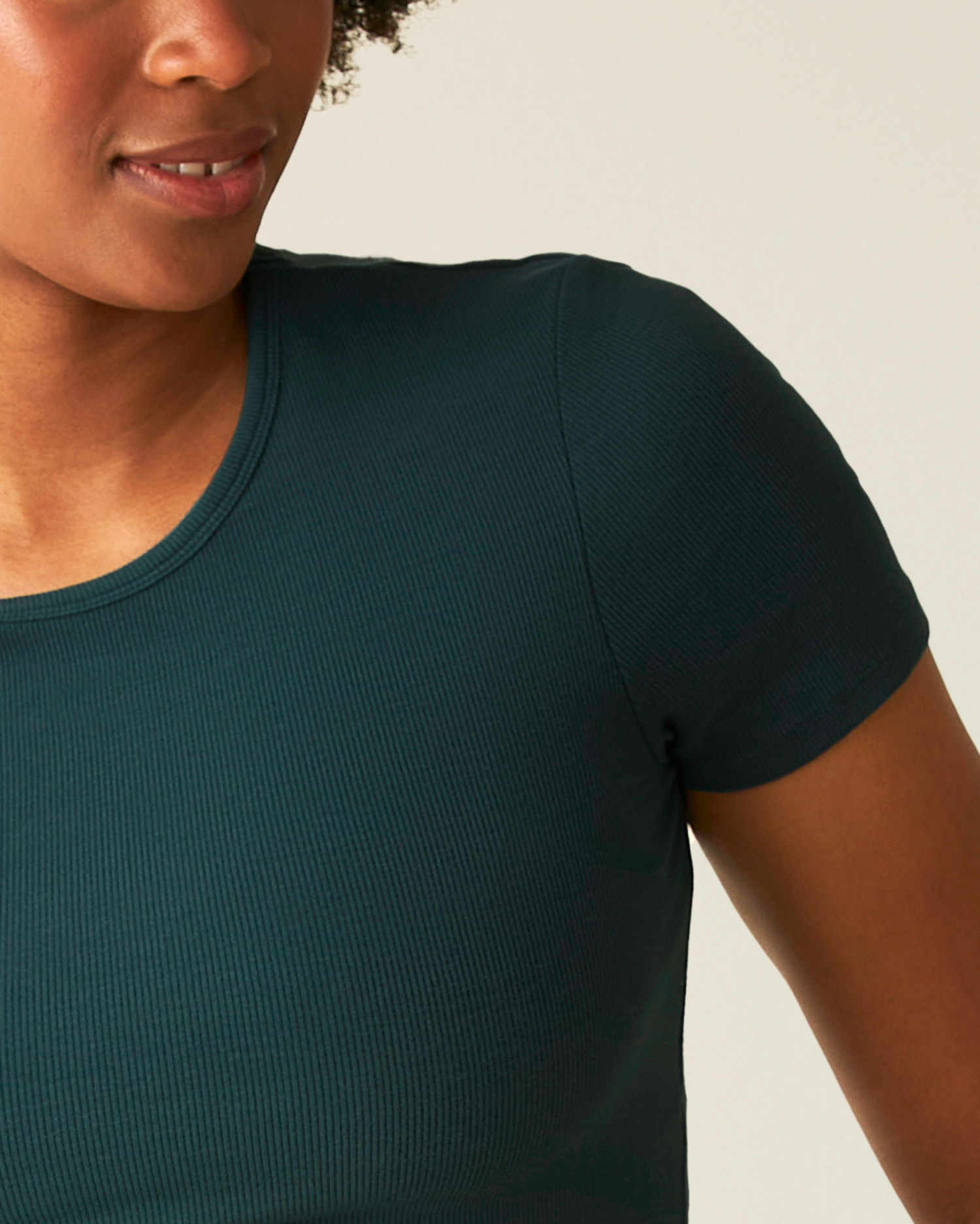 Close up of model wearing Ribbed Bamboo Crew Neck Nursing T-shirt in Evergreen