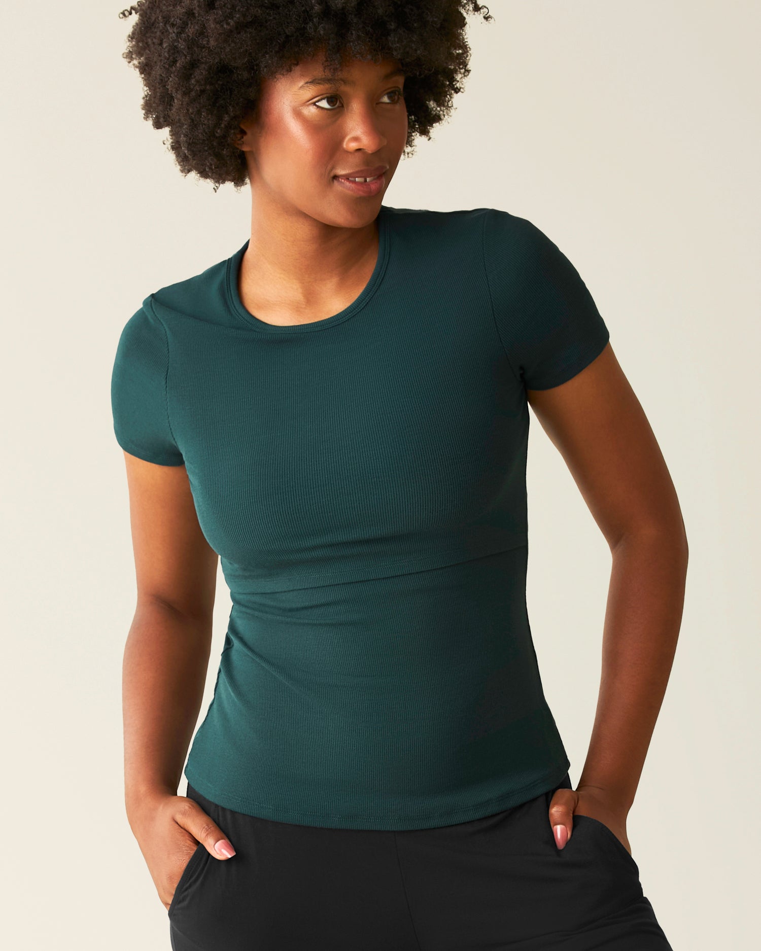 Front view of model wearing Ribbed Bamboo Crew Neck Nursing T-shirt in Evergreen@model_info:Kyra is wearing a Small.