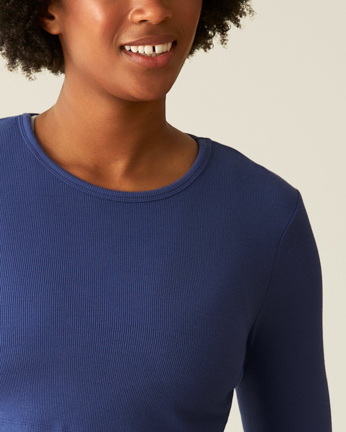 Close-up of woman wearing the Ribbed Bamboo Long Sleeve Nursing T-shirt in Deep Blue
