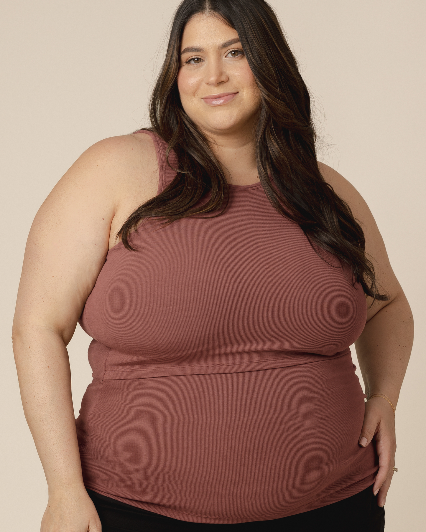 Front view of model wearing the Bamboo Racerback Nursing Tank in Redwood @model_info:Gia is wearing a 2X.
