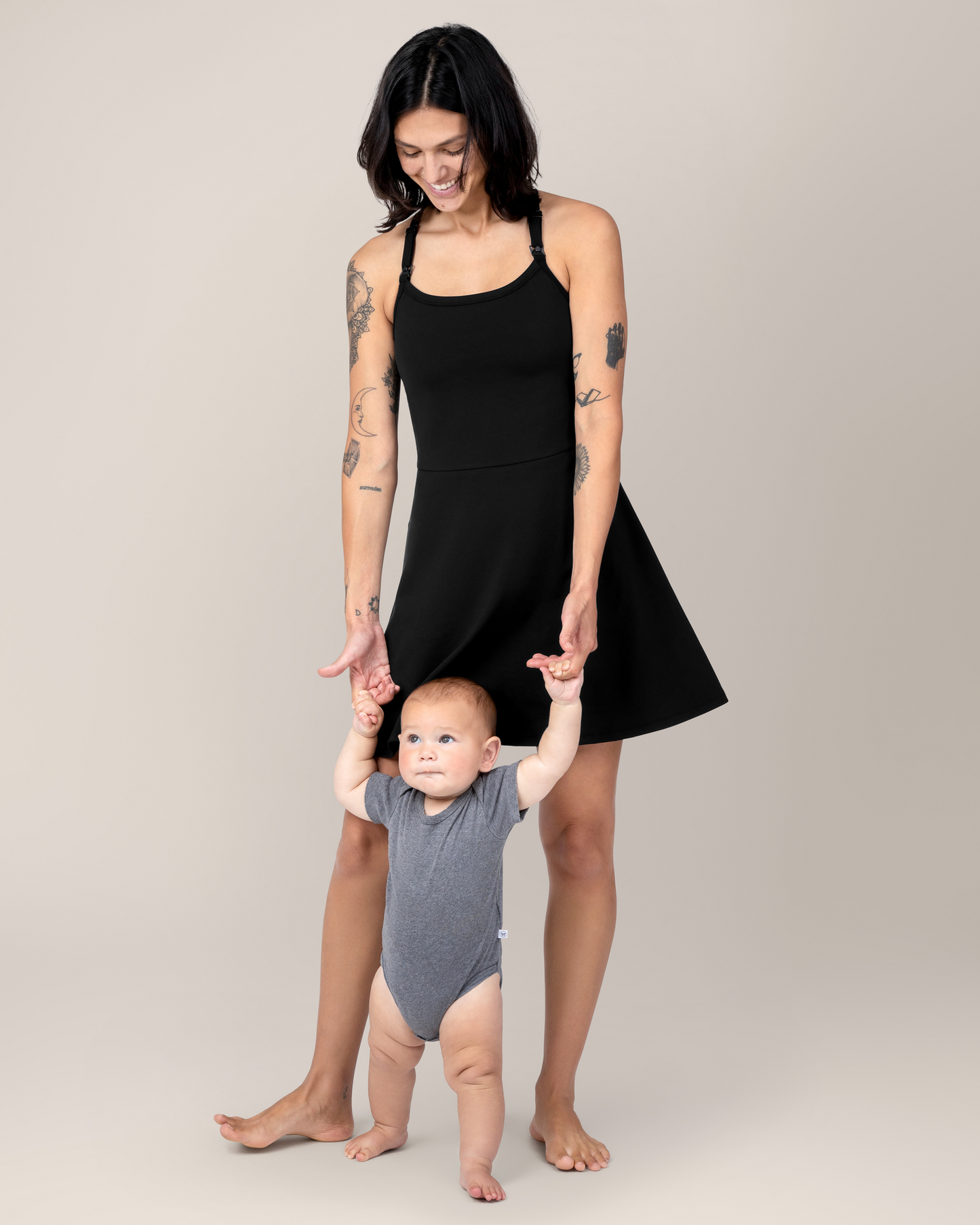 Front view of model wearing the Stevie Active Racerback Nursing Dress in Black