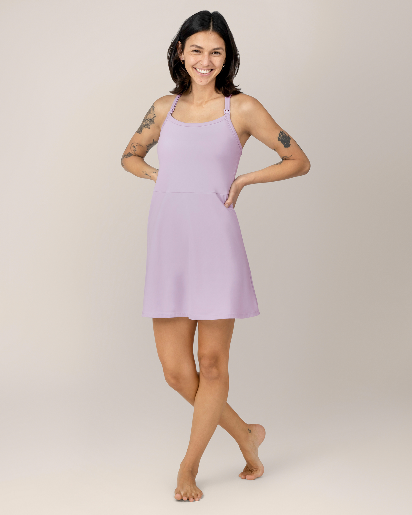 Front view of model wearing the Stevie Active Racerback Nursing Dress in Lavender Mist @model_info:Megan is 5'7" and wearing a Small.
