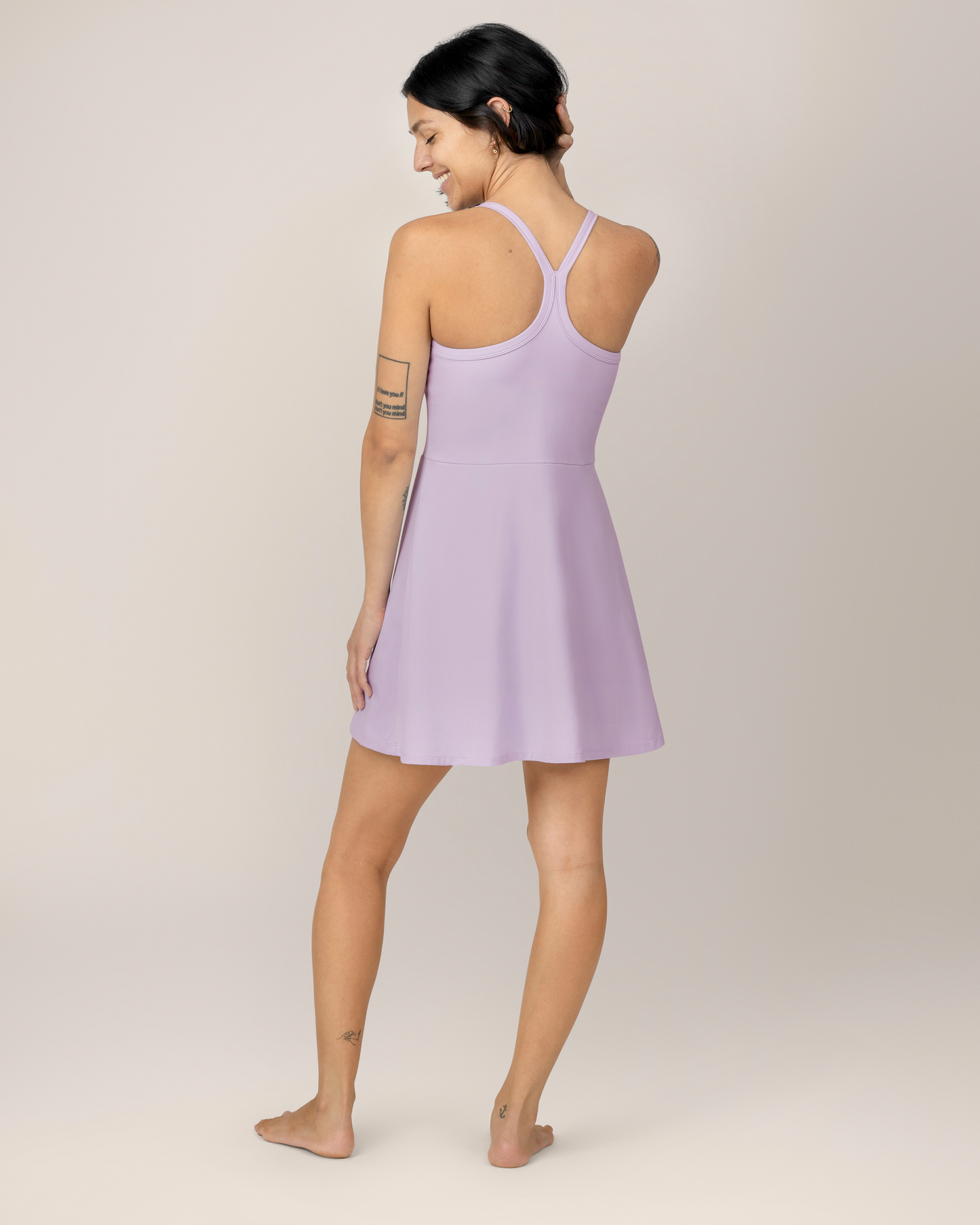 Back view of model wearing the Stevie Active Racerback Nursing Dress in Lavender Mist