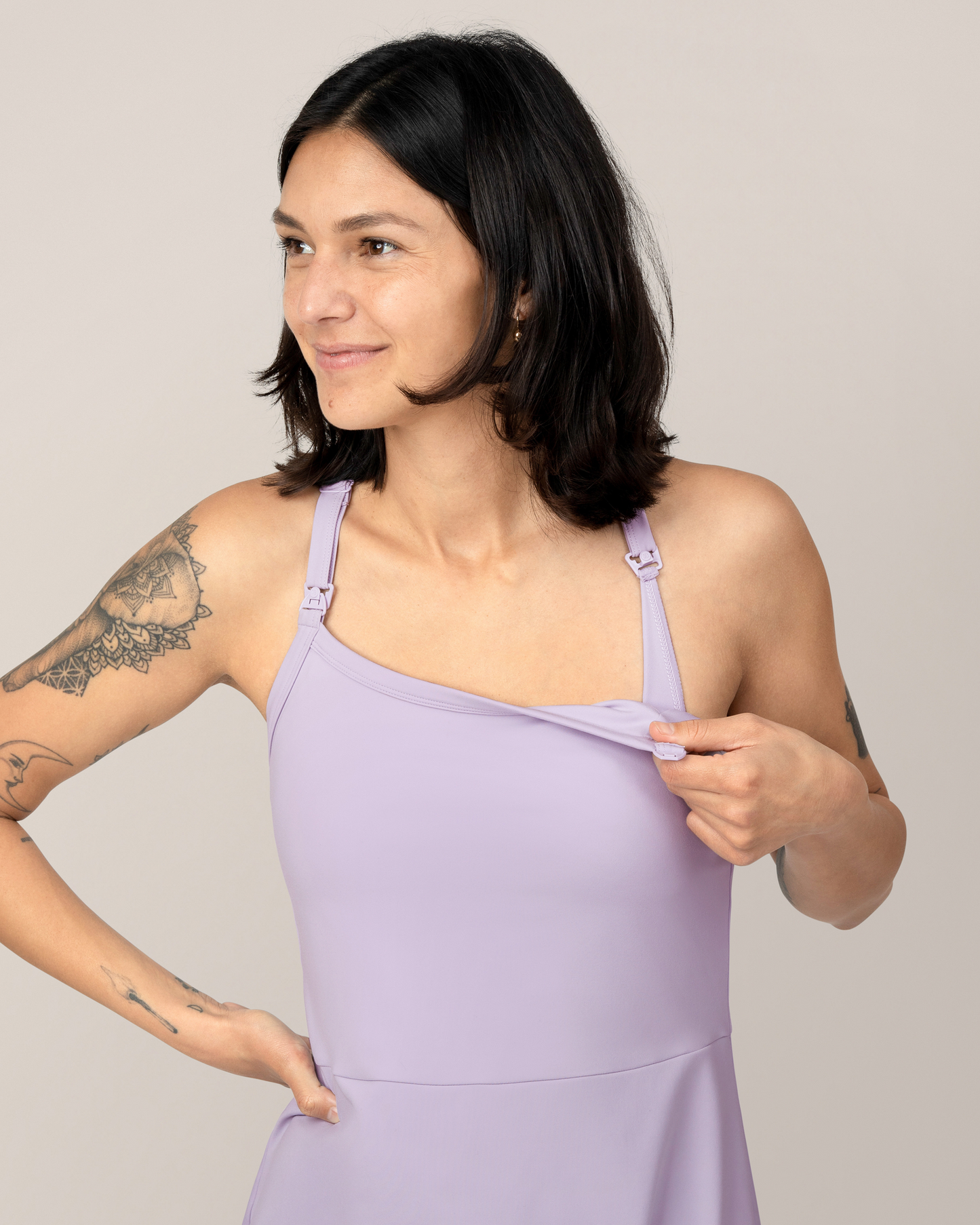 Clip down nursing access view of model in the Stevie Active Racerback Nursing Dress in Lavender Mist