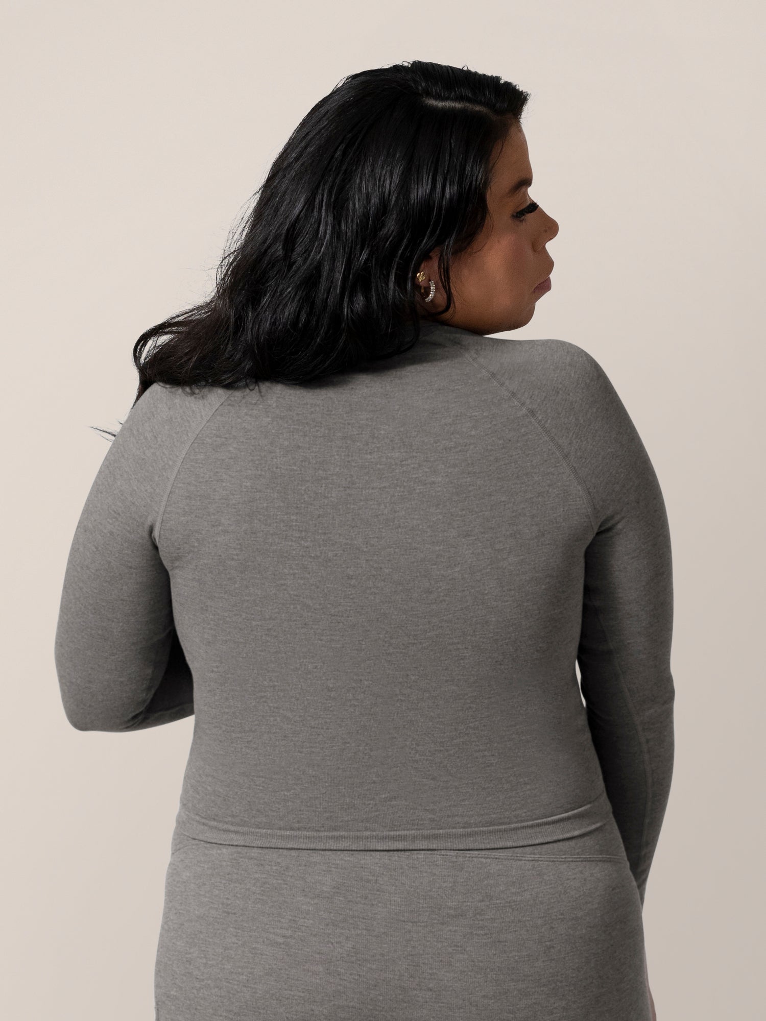 Back view of model wearing the Sublime® Bamboo Maternity & Nursing Cropped Long Sleeve Top in Charcoal.