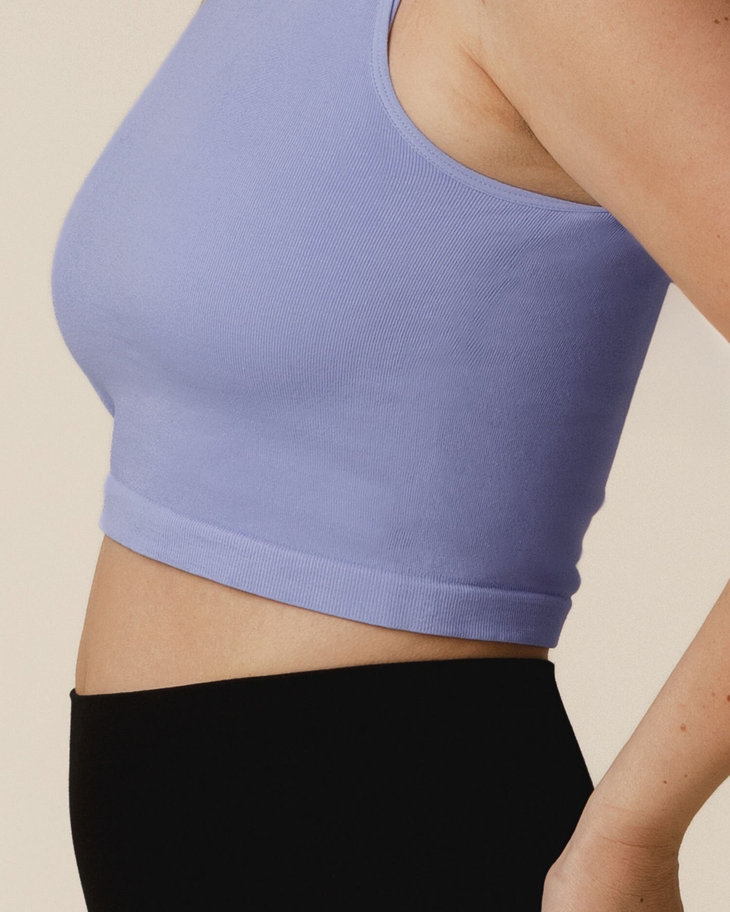 Cropped in view of model wearing the Sublime® Bamboo Hands-Free Pumping Longline Bra Top in Blue Wisteria, showing fabric detail