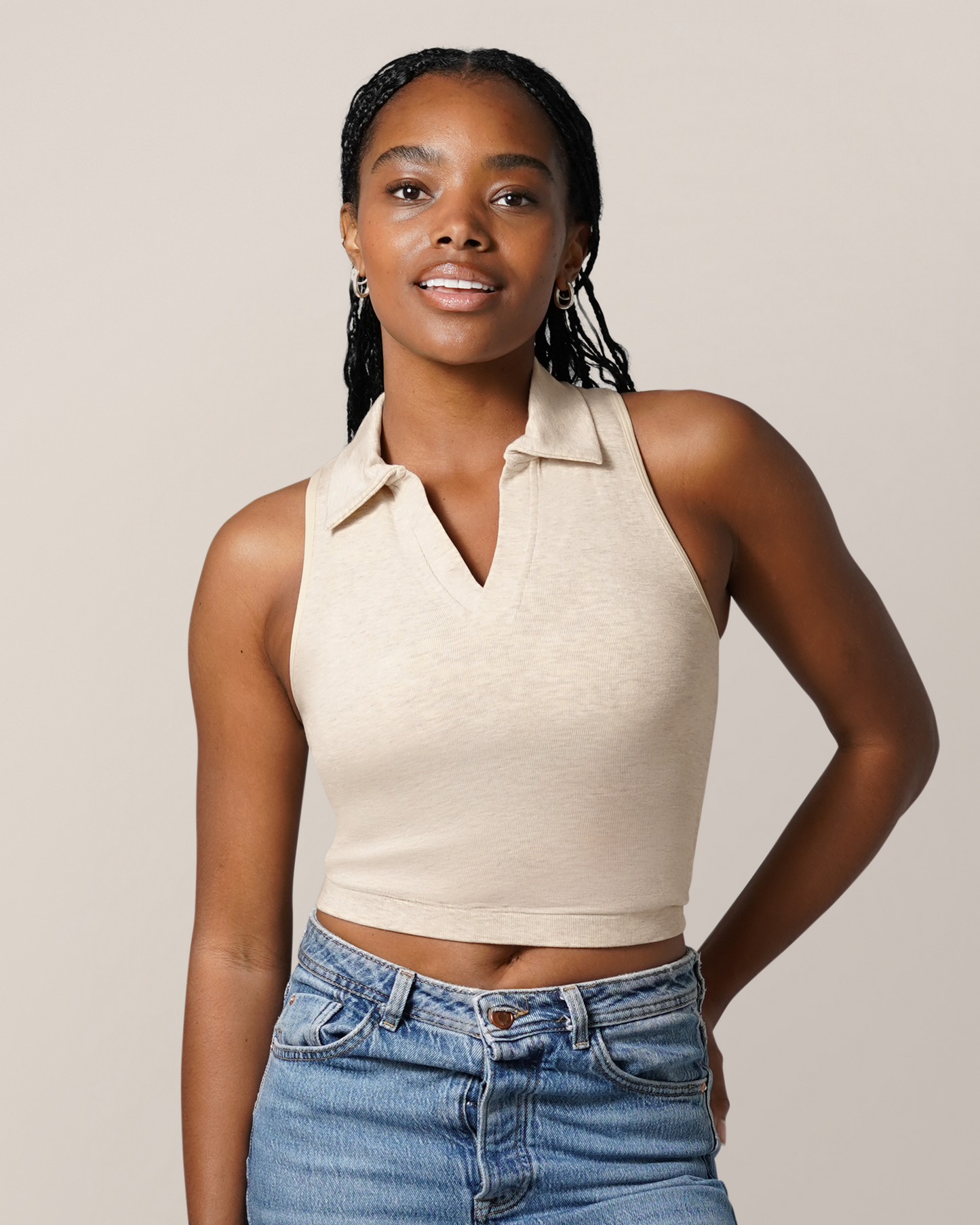 Front view of model wearing the Sublime® Bamboo Collared Maternity & Nursing Longline Bra Top in Oatmeal Heather, paired with jeans
@model_info:Josie is wearing a Small Busty.
