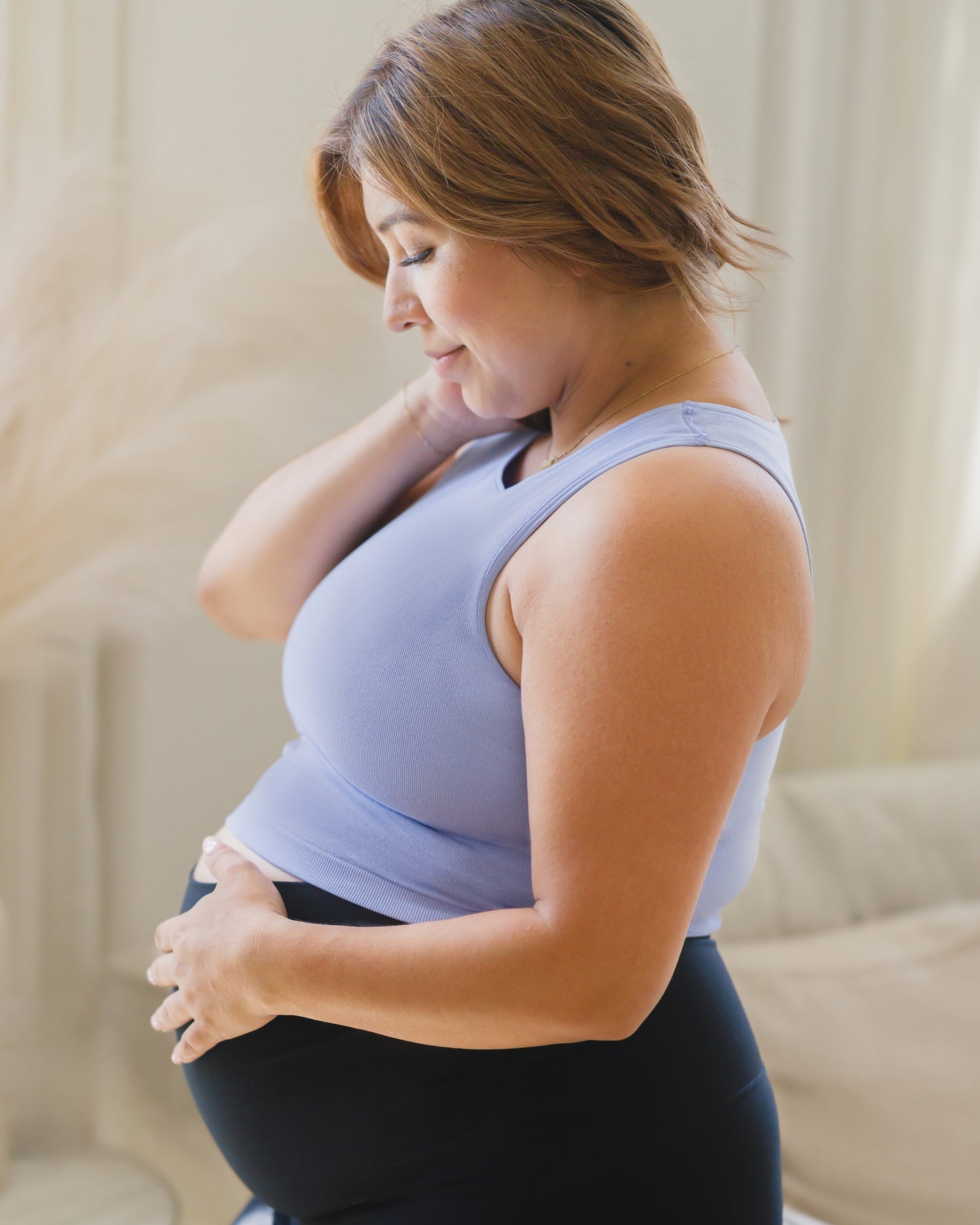 Side view of pregnant model wearing the Sublime® Bamboo Maternity & Nursing Longline Bra Top in  in Blue Wisteria