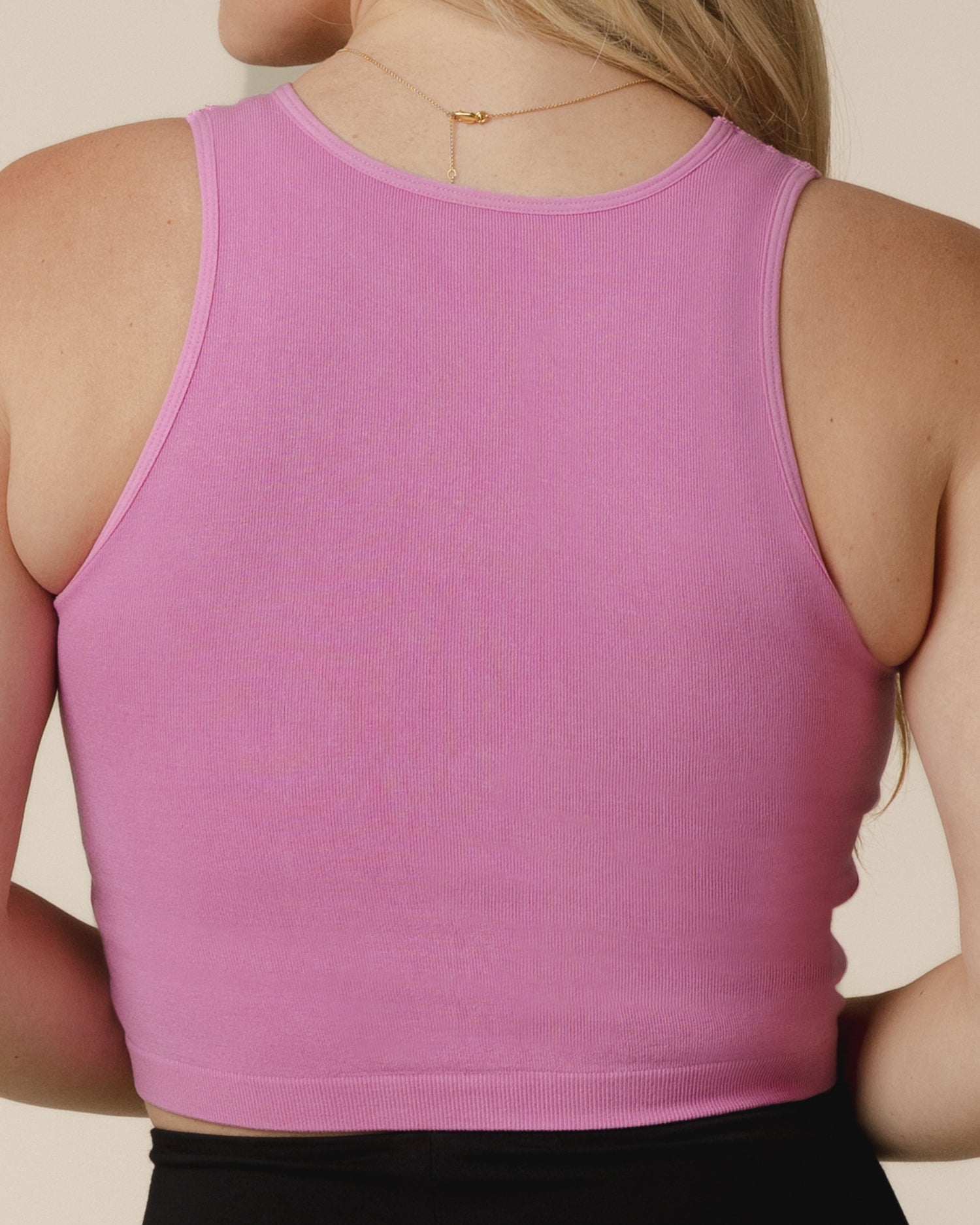 Back view of model wearing the Sublime® Bamboo Hands-Free Pumping Longline Bra Top in Soft Fuchsia