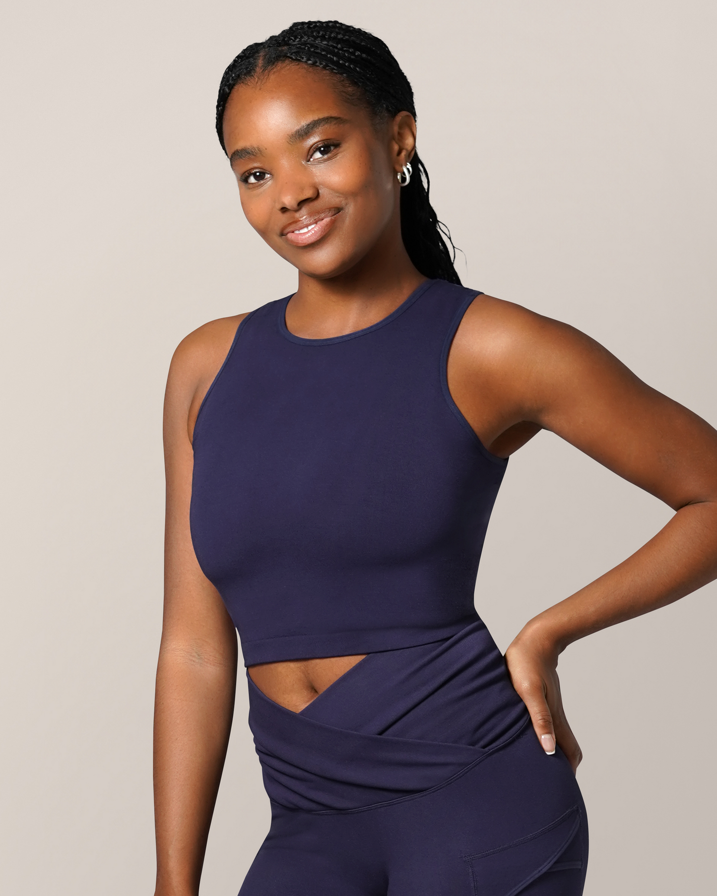 Model wearing the Sublime® Bamboo Maternity & Nursing Longline Bra Top in Navy, paired with matching Sublime® Bamboo Maternity & Postpartum Crossover Legging @model_info:Josie is wearing a Small Busty.