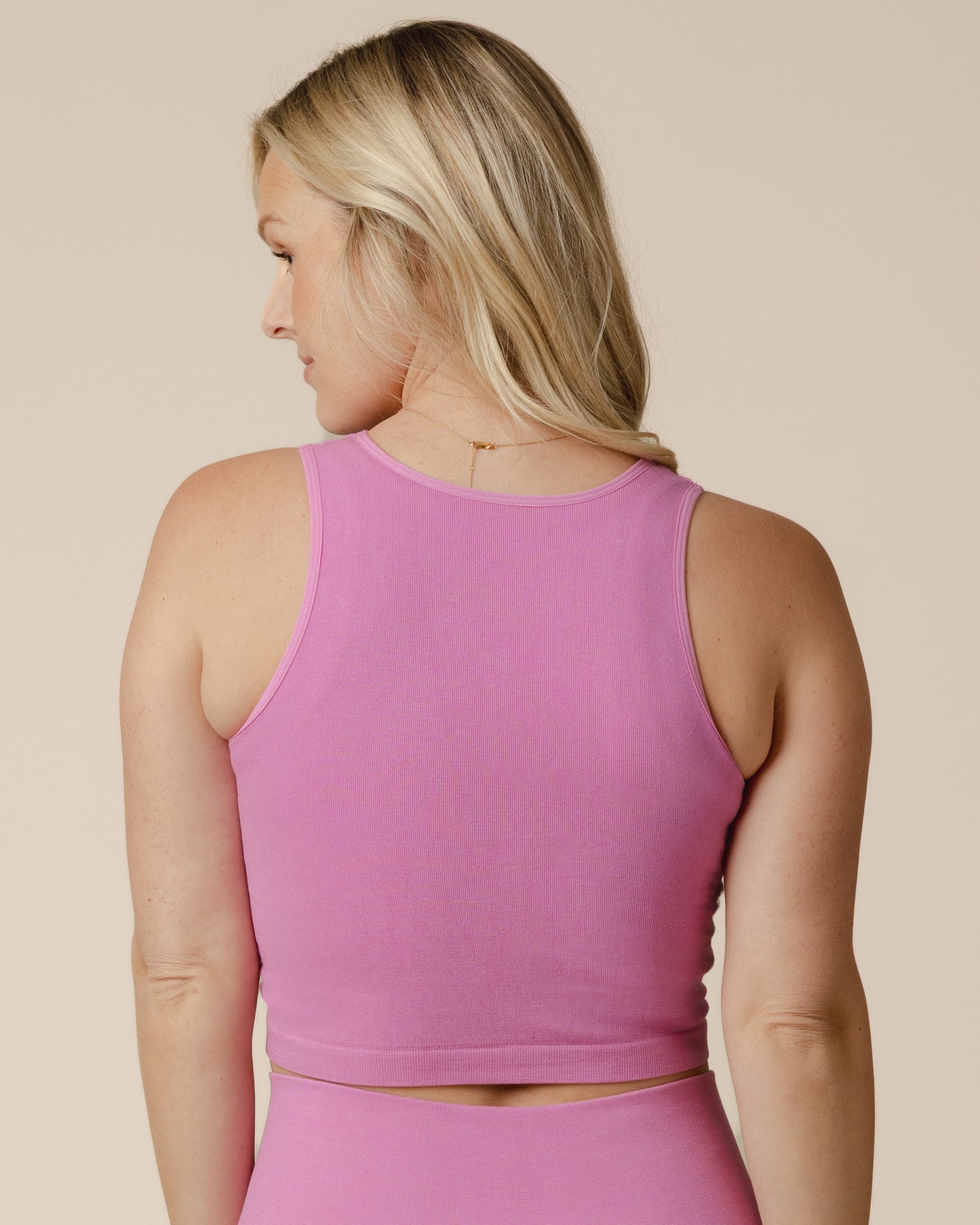 Back view of model wearing the Sublime® Bamboo Maternity & Nursing Longline Bra Top in Soft Fuchsia