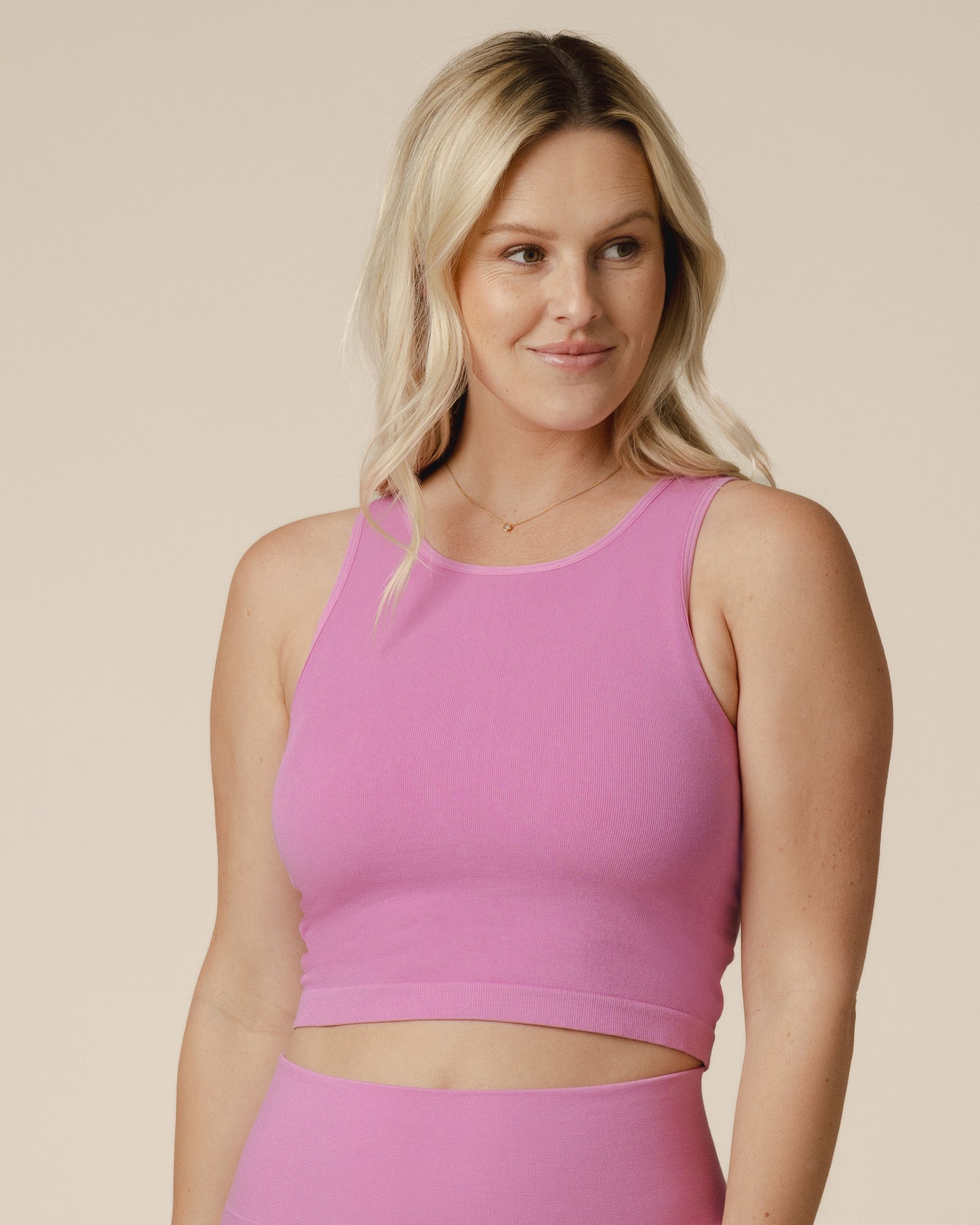 Front view of model wearing the Sublime® Bamboo Maternity & Nursing Longline Bra Top in Soft Fuchsia @model_info:Maddy is wearing a Small.