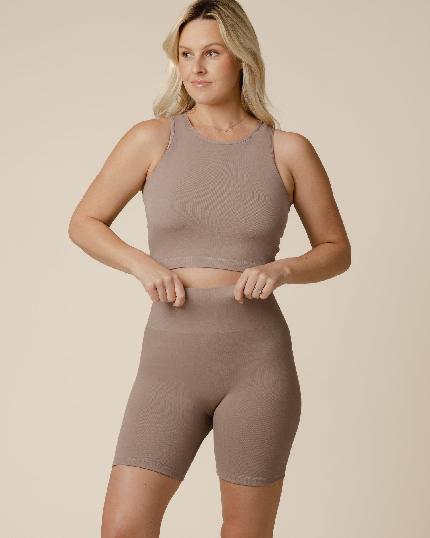 Model wearing the Sublime® Bamboo Maternity & Postpartum Bike Short in Taupe, paired with matching Sublime® Bamboo Maternity & Nursing Longline Bra Top @model_info:Maddy is wearing a Small.