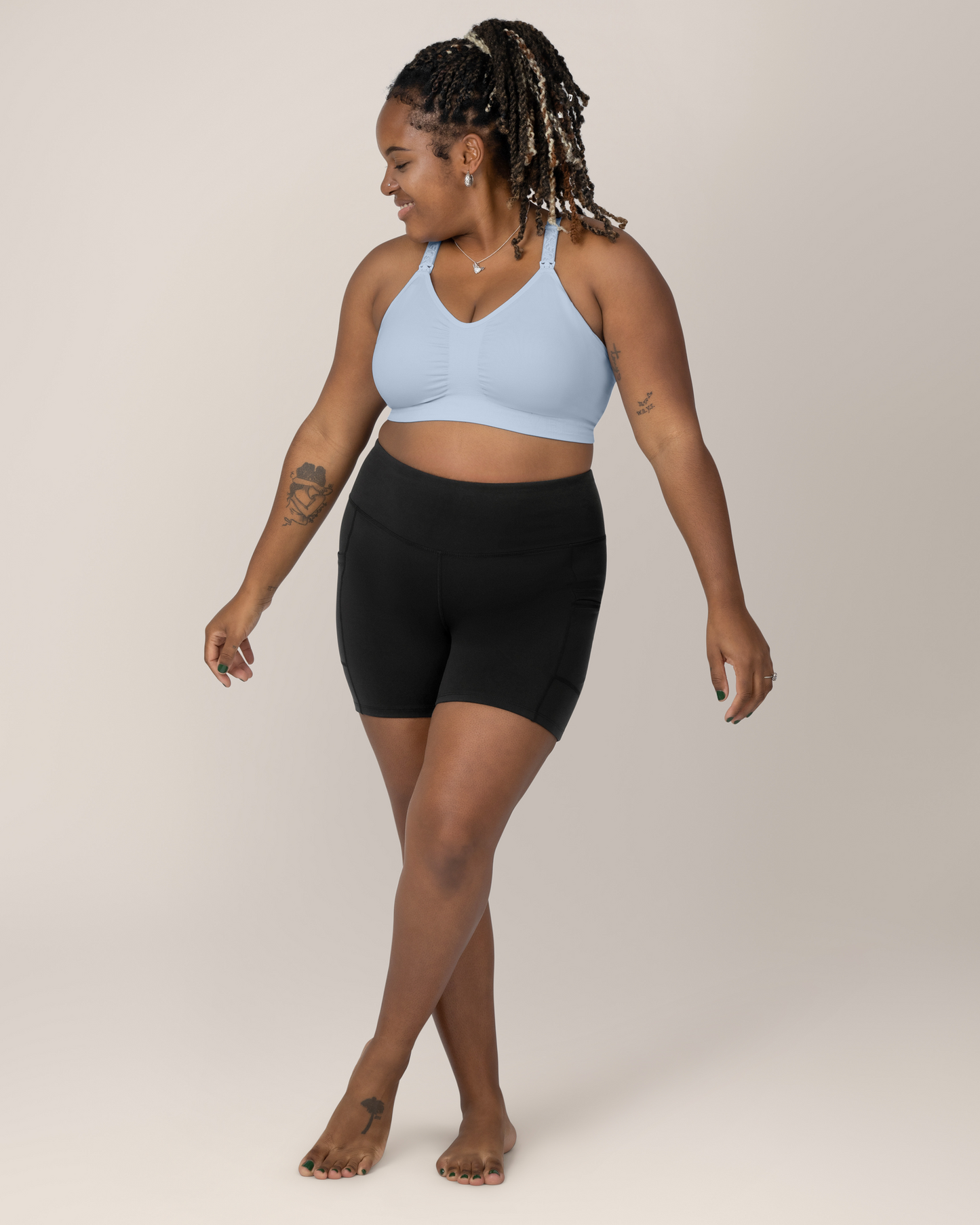 Front view of Model wearing the Sublime® Hands-Free Pumping & Nursing Sports Bra in French Blue @model_info:Tonia is wearing a Large.
