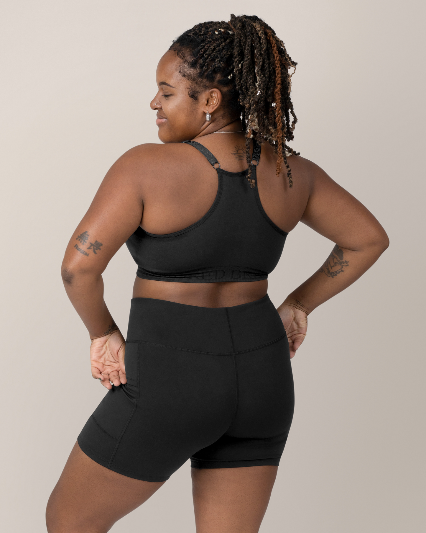 Back view of Model wearing the Stevie Active Postpartum Bike Short in Black