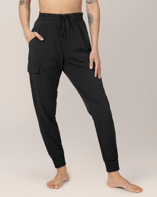 Front view of Model wearing the Remy Maternity & Postpartum Cargo Jogger in Black with matching Presley Active Zip Front Nursing Top @model_info:Ezmie is 5'6" and wearing a Small.