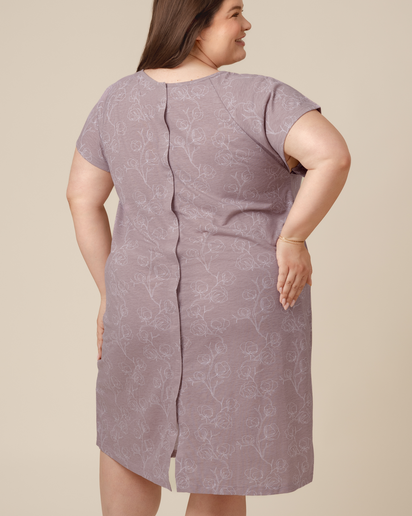 Back view of model wearing the Universal Labor & Delivery Gown in Lilac Bloom