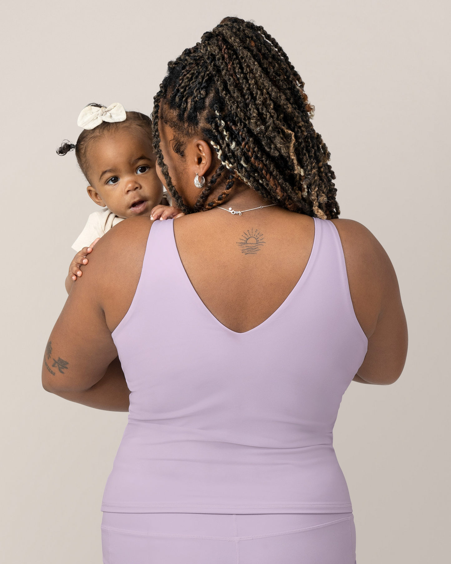 Back view of Model wearing the Wren Active V-neck Nursing Tank Top in Lavender Mist