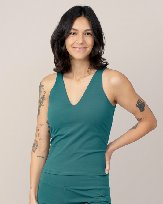 Front view of Model wearing the Wren Active V-Neck Nursing Tank Top in Teal @model_info:Megan is wearing a Small.
