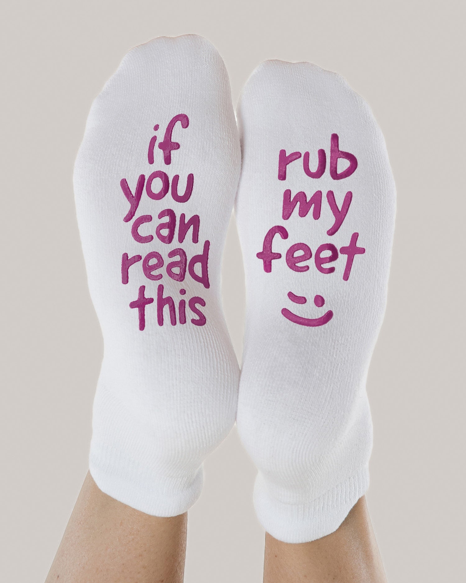 Rub My Feet Labor & Delivery socks shown on model